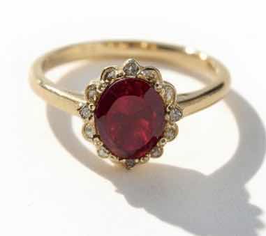 Photo 1 of STERLING SILVER W GOLD OVERLAY W NATURAL RUBY CORUNDUM APPROX 2.94 CTW OVAL BRILLIANT FACETED AND NATURAL DIAMOND 0.18 CTW RING GGA CERTIFIED EST RING SIZE 6-7) -RN040646