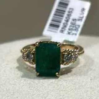 Photo 1 of 925 STERLING SILVER W 18K GOLD OVERLAY EMERALD & DIAMOND RING
EMERALD APPROX 3.95 CTW AND DIAMONDS APPROX 0.32 CTW
GGA CERTIFIED, EST SIZE 7.5  -RN040653