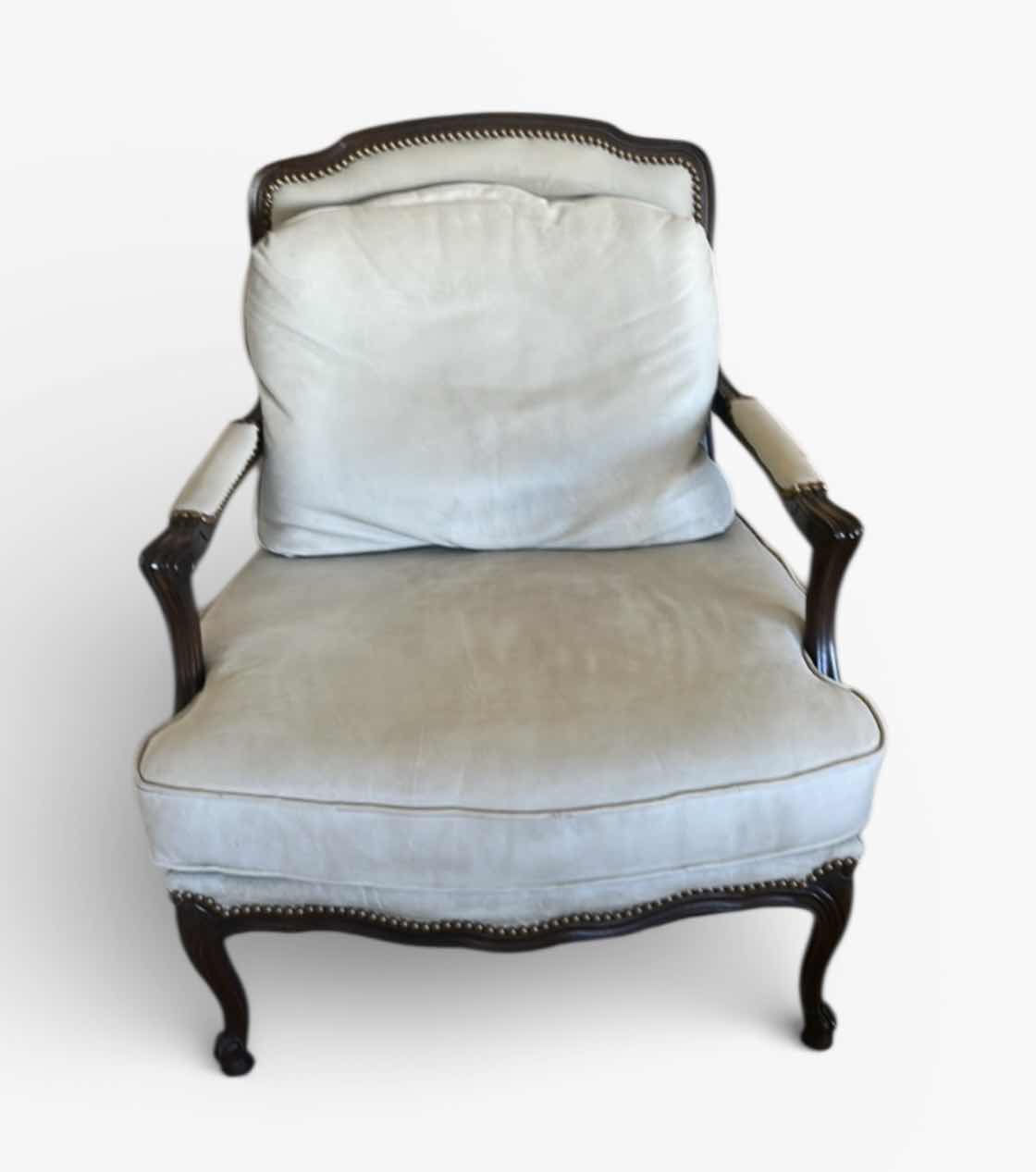 Photo 1 of LOUIS XV-STYLE BERGÈRE CHAIR WITH DARK WOOD FRAME AND LIGHT-COLORED LEATHER OR SUEDE UPHOLSTERY. 31“ x 29“ x H35“