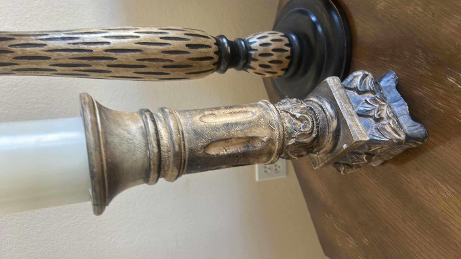 Photo 1 of SET OF THREE DECORATIVE CANDLE HOLDERS IN VARIED HEIGHTS. CARVED WOOD  WITH A DISTRESSED FINISH. (TALLEST H25 1/2”)