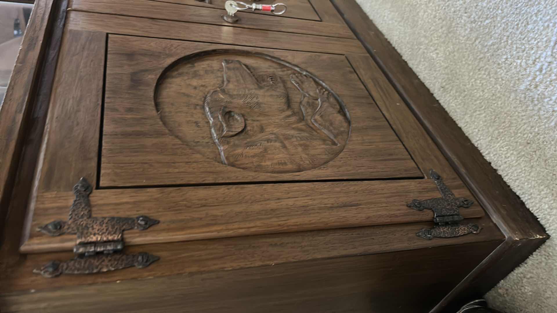 Photo 1 of WOODEN GUN CABINET WITH GLASS FRONT. FEATURES CARVED WOOD DOORS ON LOWER CABINET AND LOCKING STORAGE. DESIGNED TO DISPLAY AND STORE FIREARMS. HOLDS 8,  LOWER CABINET 33 1/4 x 16“ x H22“ , TOP CABINET  32“ x 10 1/2“ x H54 1/2“
