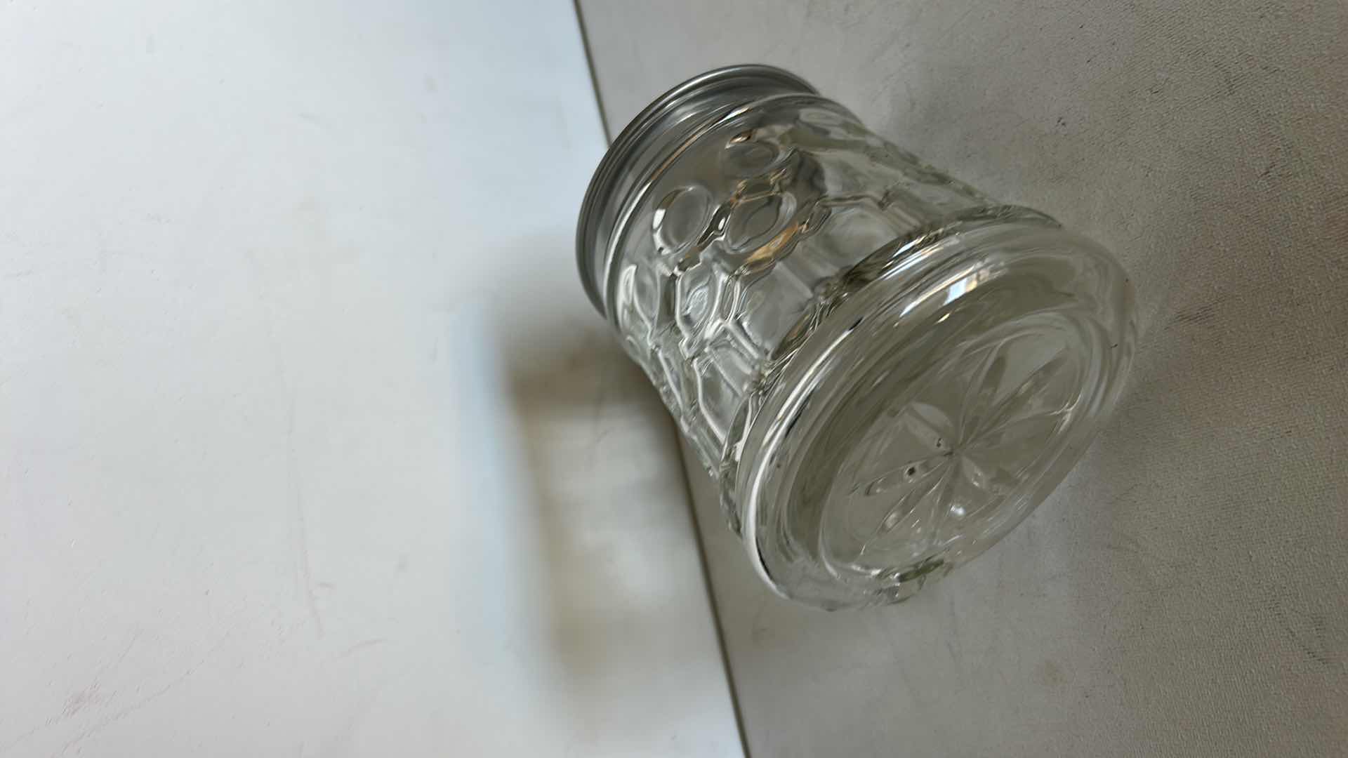 Photo 1 of ORIGINAL BMF SCHNAPSKRUGERL GLASS BEER STEIN.  WITH TEXTURED GLASS BODY AND PEWTER LID. FEATURES A THUMB LIFT HANDLE AND DECORATIVE TOP MEDALLION. H6”