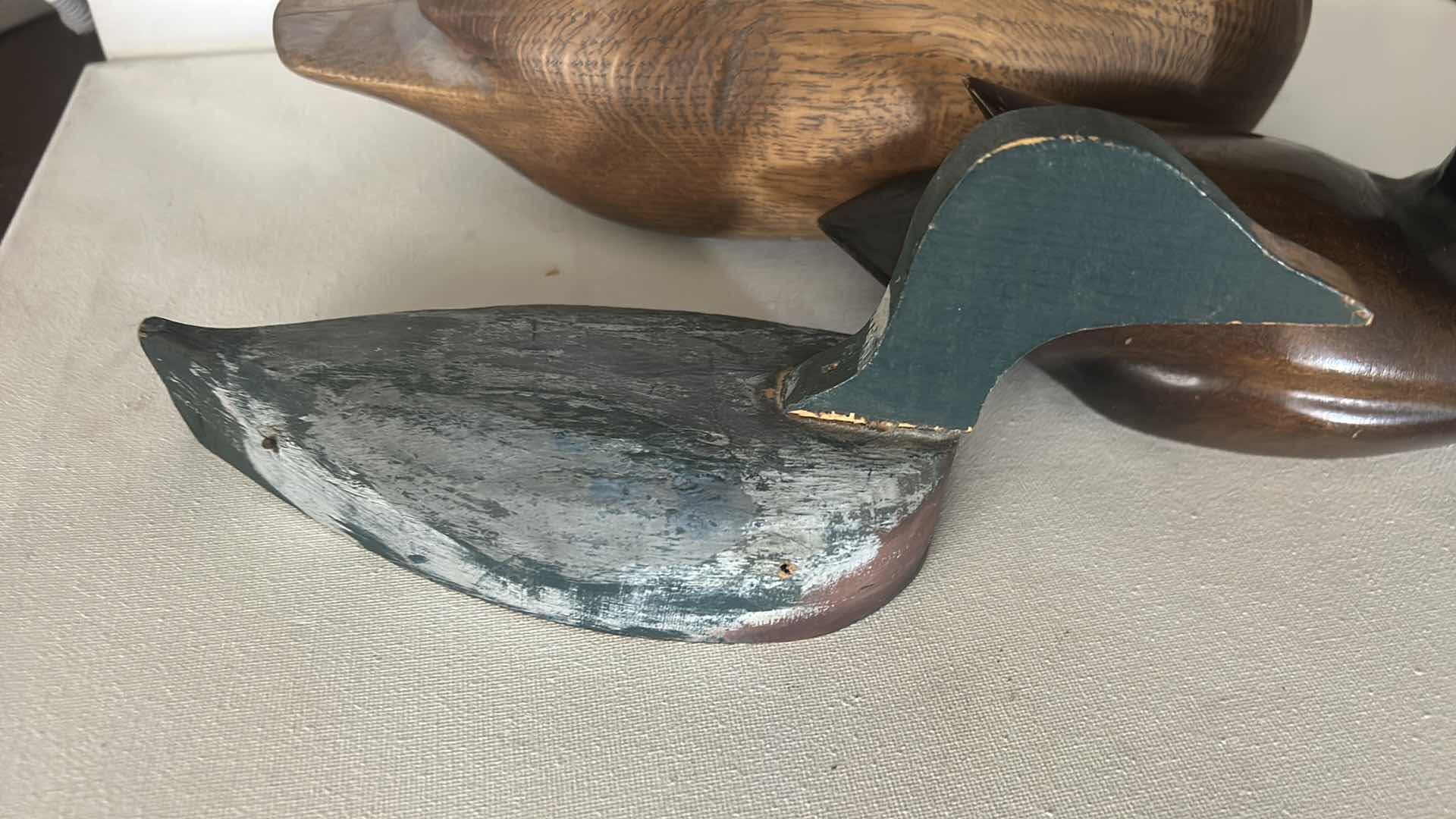 Photo 1 of 3 WOODEN DUCK DECOYS. (LONGEST 14”)