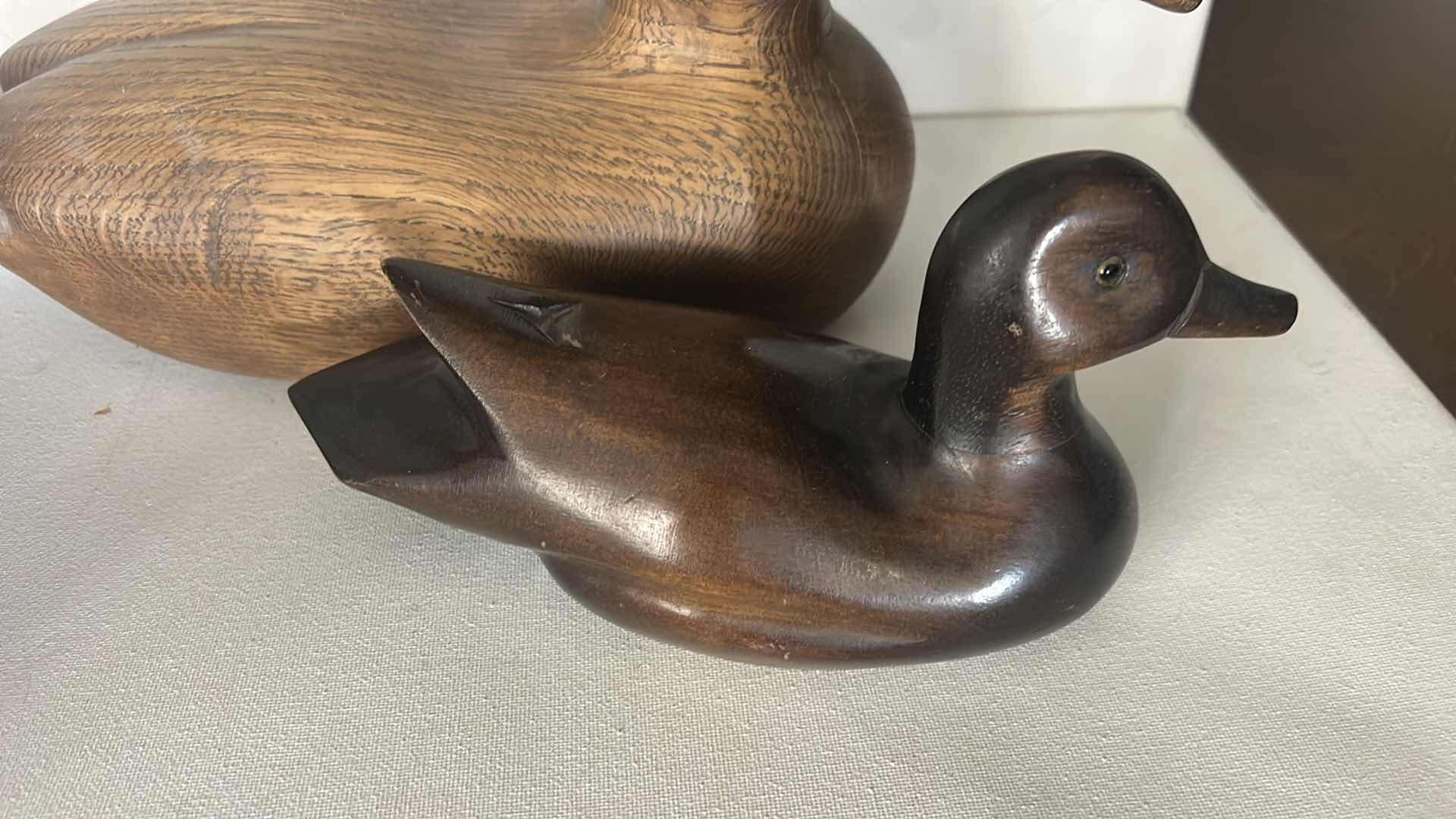 Photo 1 of 3 WOODEN DUCK DECOYS. (LONGEST 14”)