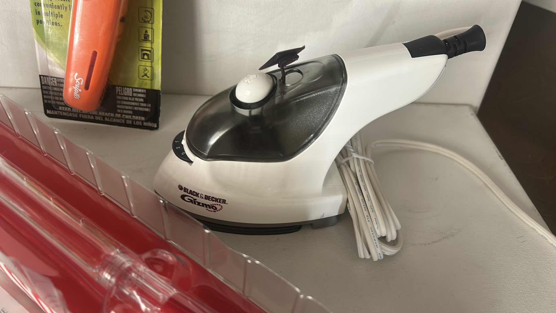 Photo 1 of 3 HOUSEHOLD ITEMS- STEAM IRON, LIGHTER AND MORE