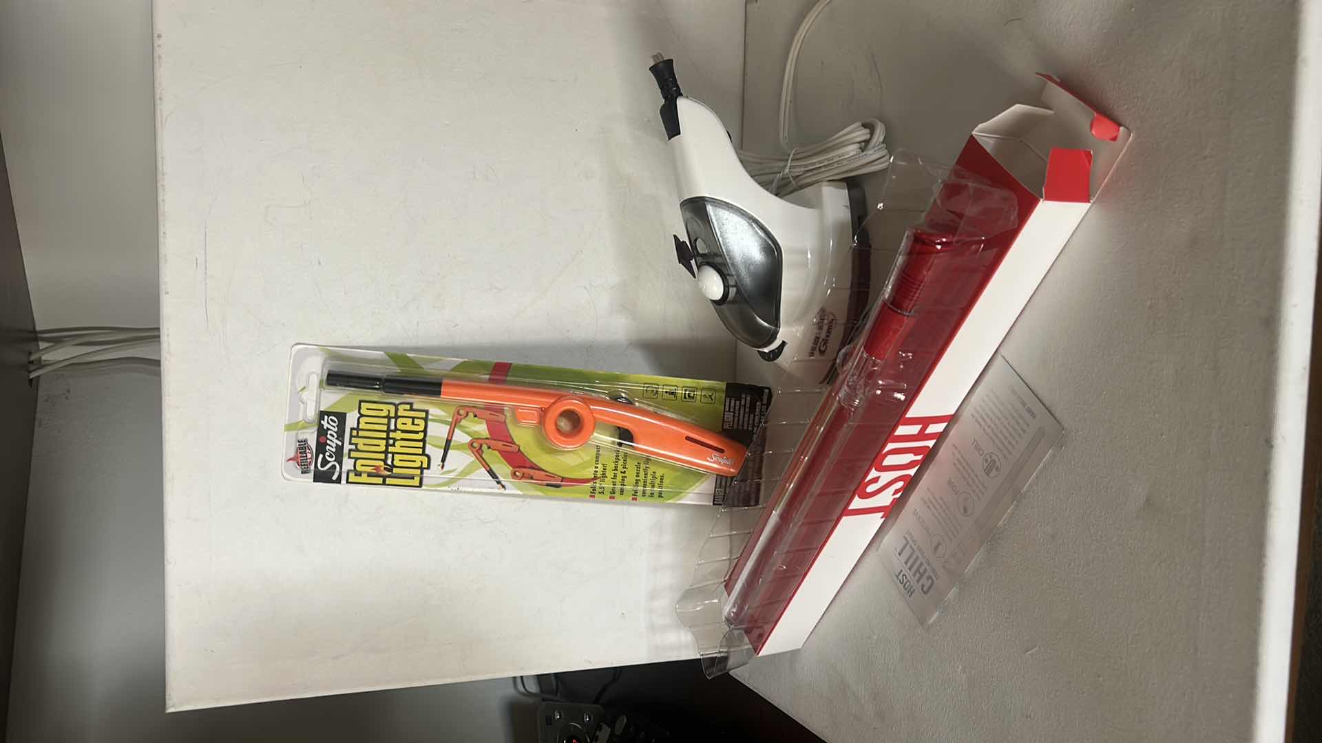 Photo 1 of 3 HOUSEHOLD ITEMS- STEAM IRON, LIGHTER AND MORE