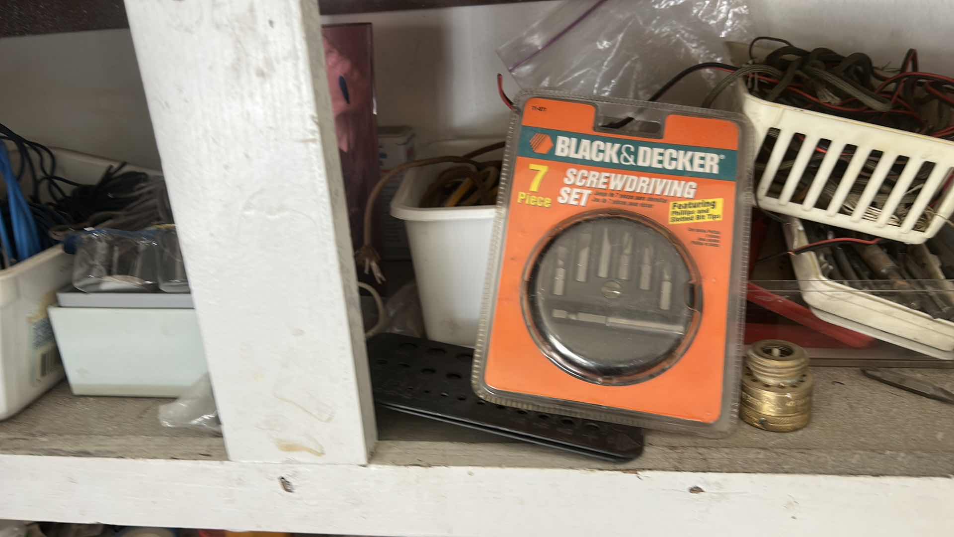 Photo 1 of CONTENTS OF CABINET IN GARAGE