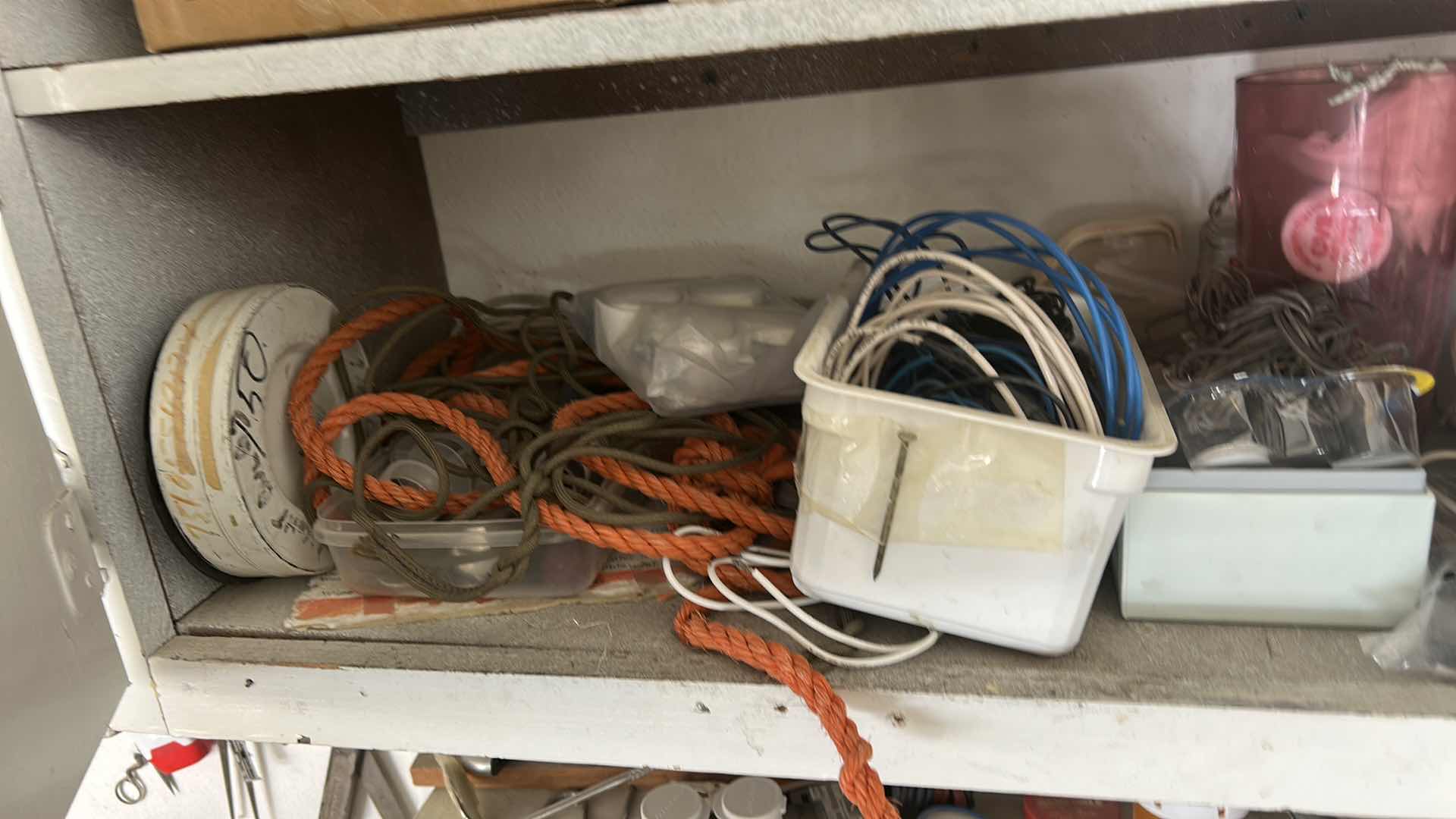 Photo 1 of CONTENTS OF CABINET IN GARAGE