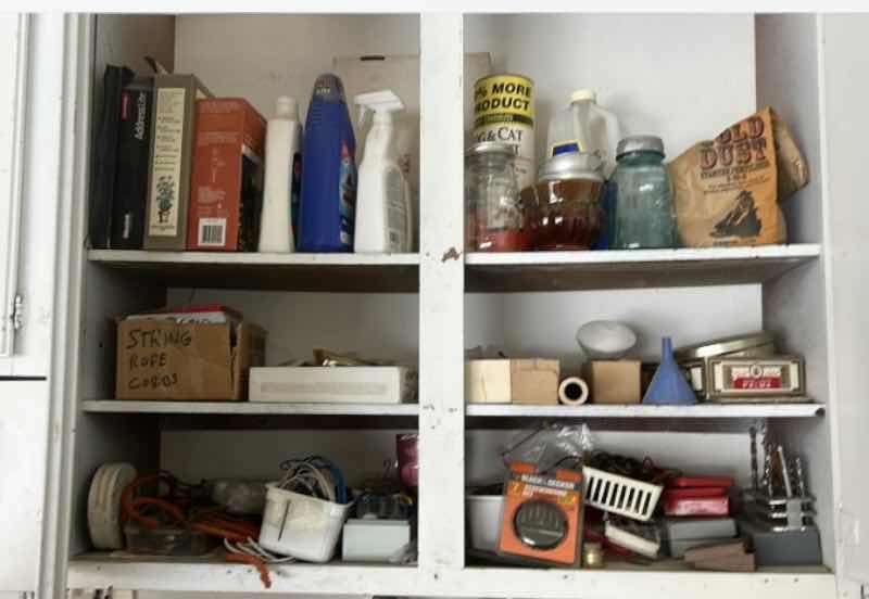 Photo 1 of CONTENTS OF CABINET IN GARAGE