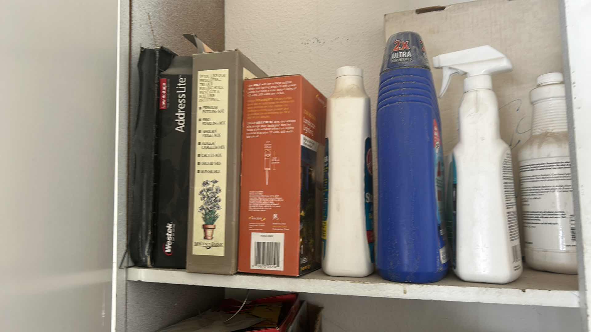 Photo 1 of CONTENTS OF CABINET IN GARAGE