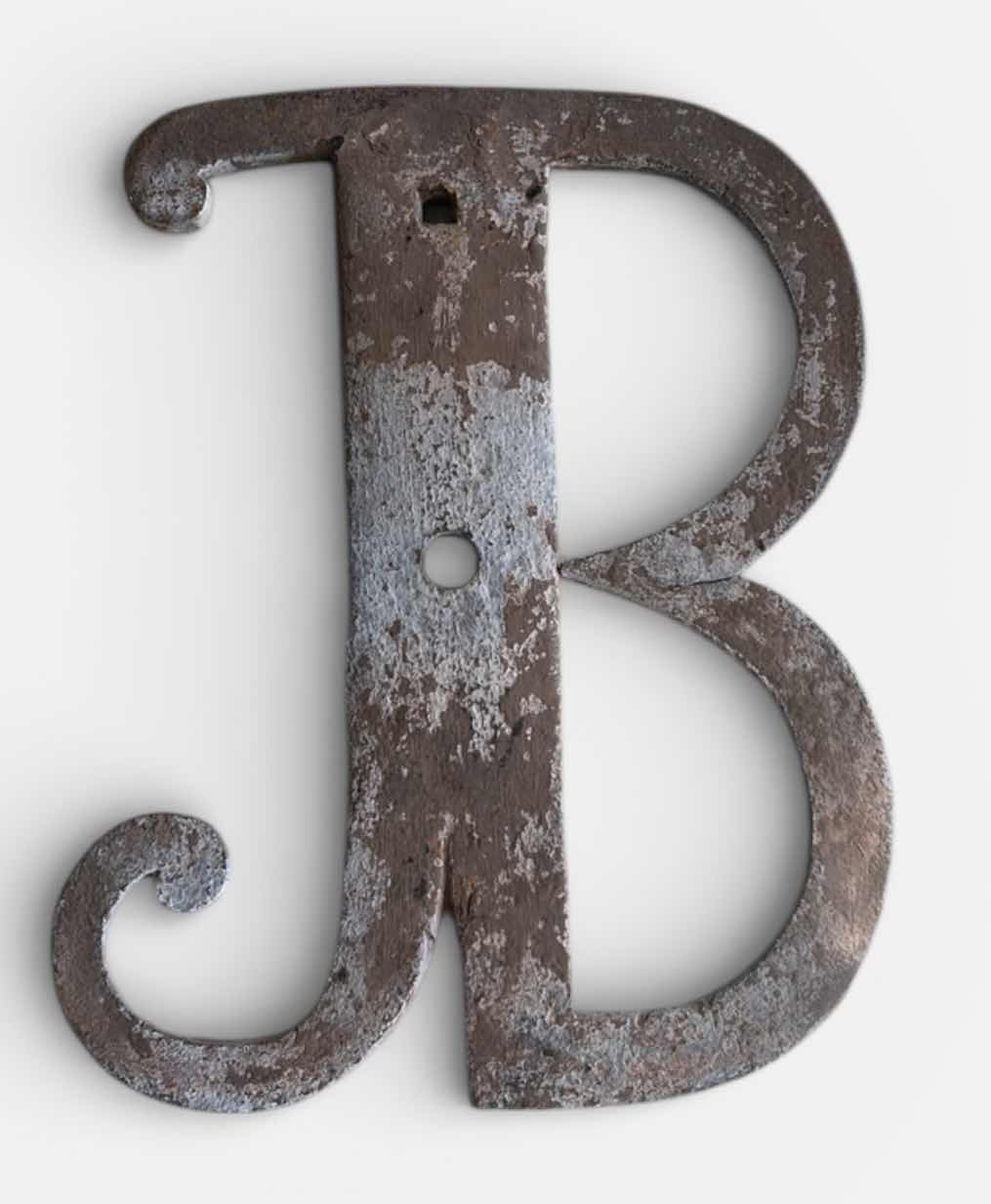 Photo 1 of HEAVY METAL LETTER B WALL DECOR H12”