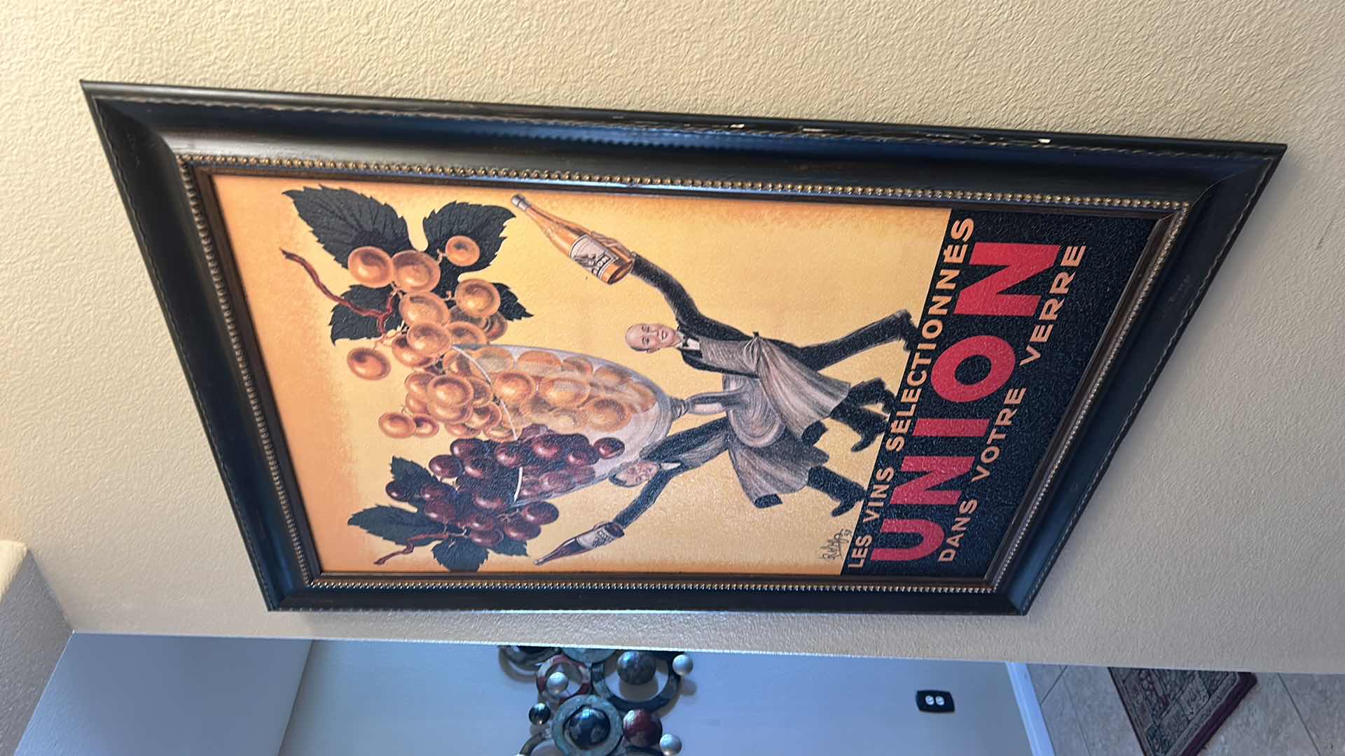 Photo 1 of FRAMED VINTAGE SIGNED ADVERTISEMENT TITLED “LES VINS SELECTIONNES UNION DANS VOTRE VERRE,” DESIGNED BY ROBERT WOLFF. 30” x H42”