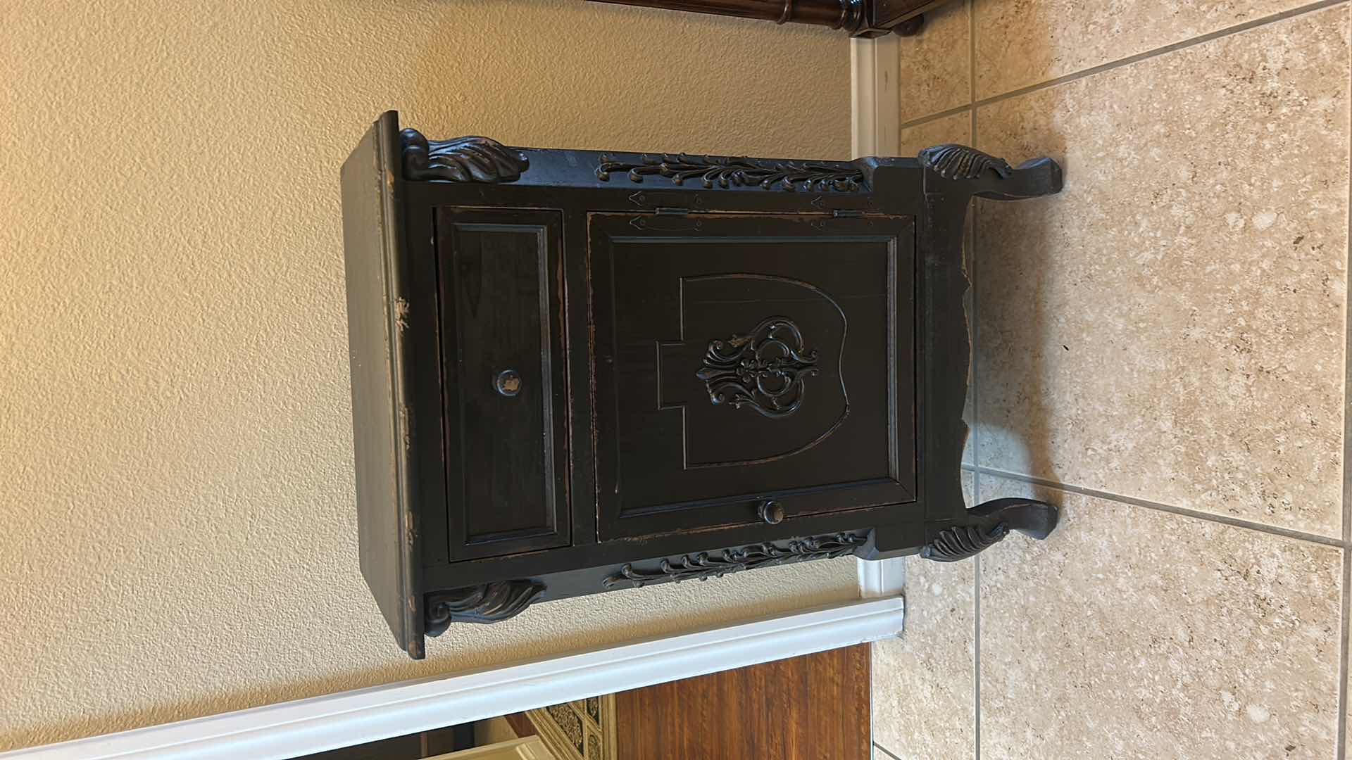 Photo 1 of WOOD ACCENT CABINET WITH SINGLE DRAWER AND DOOR, FEATURING ORNATE APPLIED SCROLL DETAILS, SHIELD-FRONT PANEL, AND CURVED FEET. 19 1/2“ x 12 1/2“ x H32 1/2“