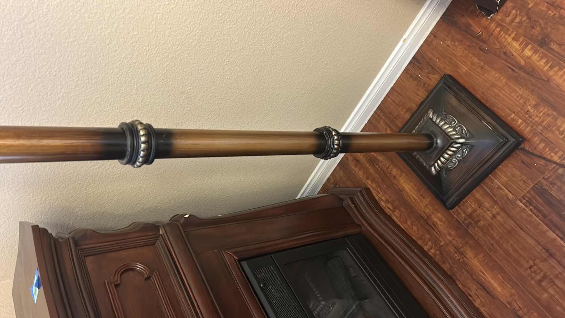 Photo 1 of VINTAGE-STYLE TORCHIERE FLOOR LAMP, FEATURING A TALL METAL BASE WITH A FAUX WOOD OR BRONZE FINISH AND AN UPWARD-FACING FROSTED GLASS BOWL SHADE. H 6’