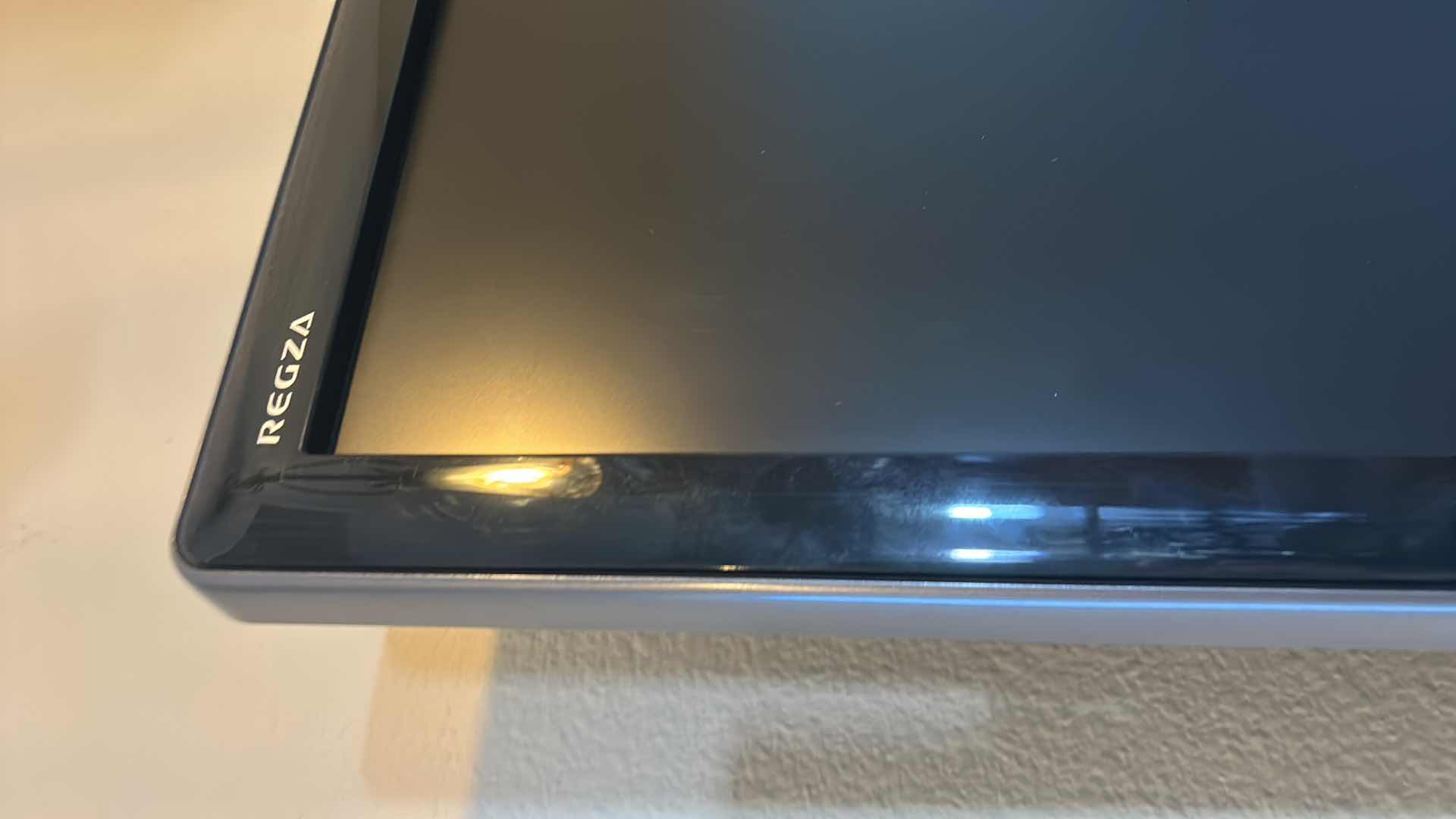 Photo 1 of 42” TOSHIBA WALL MOUNT TV WITH REMOTE