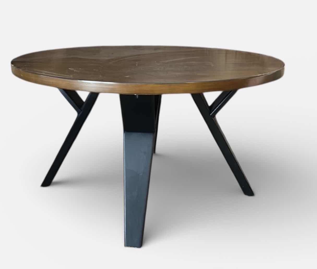 Photo 1 of ROUND WOOD COCKTAIL TABLE WITH BLACK LEGS 3’ X H20”