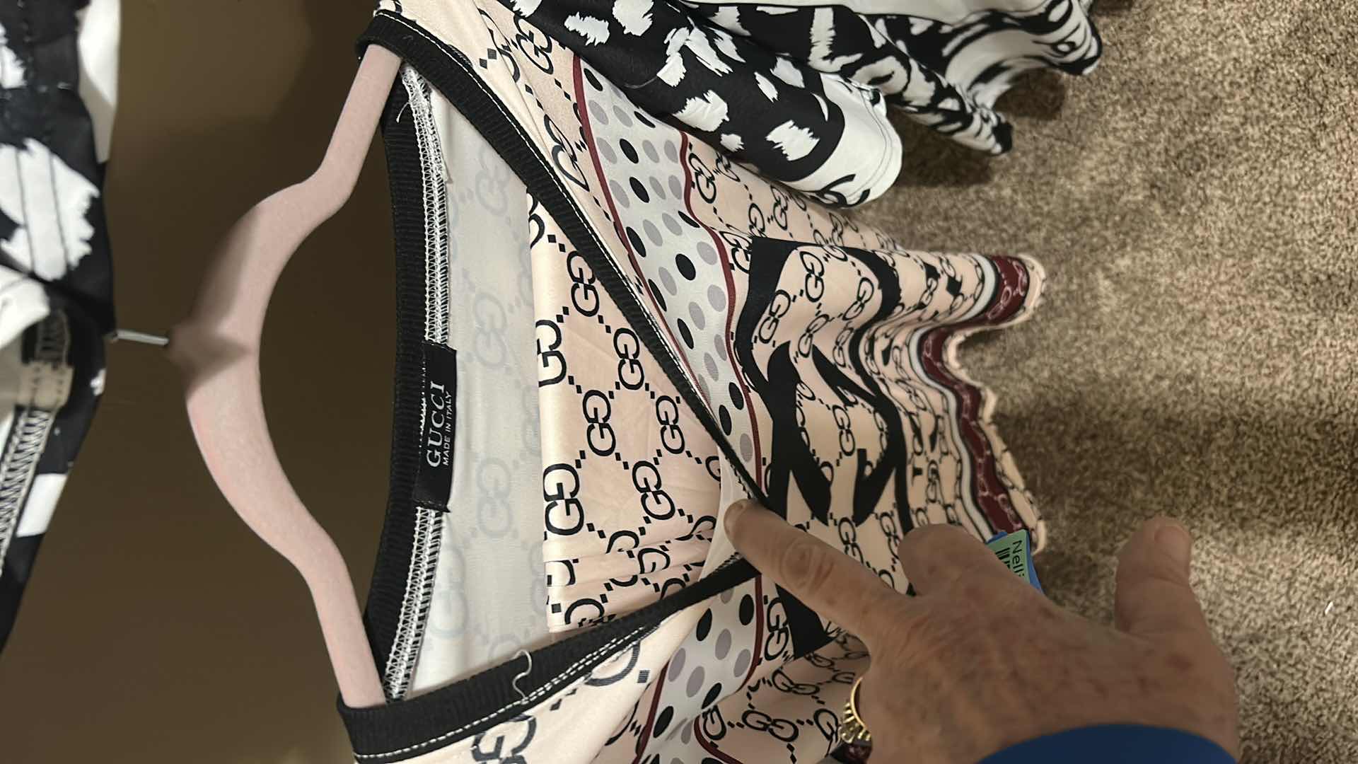 Photo 1 of CHANEL AND GUCCI SHORTS AND TOPS