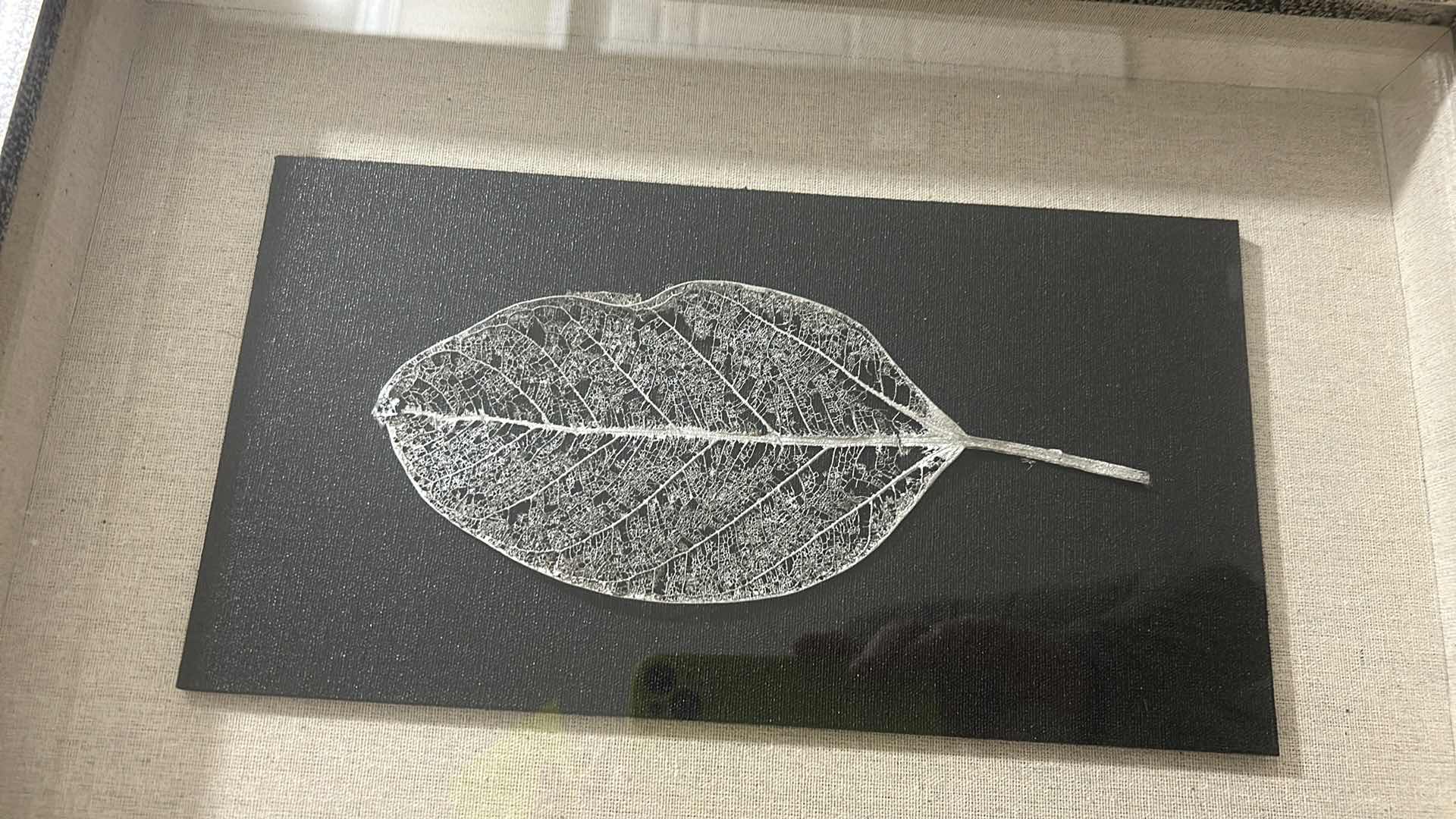 Photo 1 of GILDED LEAVES SHADOW BOXES SET OF 4 - PRESERVED LEAVES FINISHED IN ELEGANT GOLD AND SILVER LEAF, MOUNTED ON A BLACK LINEN BACKING, WITH AN OATMEAL LINEN INTERIOR LINER. SHADOW BOXES ARE FRAMED IN A HEAVILY BURNISHED SILVER LEAF.
DIMENSIONS: 12 W X 17 H X 