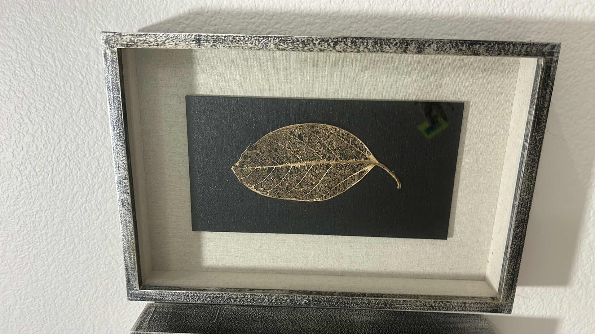 Photo 1 of GILDED LEAVES SHADOW BOXES SET OF 4 - PRESERVED LEAVES FINISHED IN ELEGANT GOLD AND SILVER LEAF, MOUNTED ON A BLACK LINEN BACKING, WITH AN OATMEAL LINEN INTERIOR LINER. SHADOW BOXES ARE FRAMED IN A HEAVILY BURNISHED SILVER LEAF.
DIMENSIONS: 12 W X 17 H X 