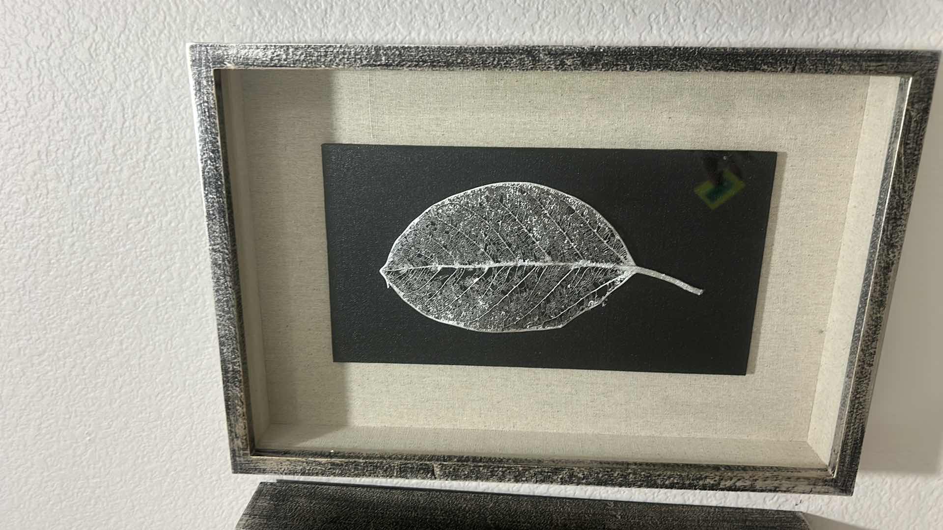 Photo 1 of GILDED LEAVES SHADOW BOXES SET OF 4 - PRESERVED LEAVES FINISHED IN ELEGANT GOLD AND SILVER LEAF, MOUNTED ON A BLACK LINEN BACKING, WITH AN OATMEAL LINEN INTERIOR LINER. SHADOW BOXES ARE FRAMED IN A HEAVILY BURNISHED SILVER LEAF.
DIMENSIONS: 12 W X 17 H X 