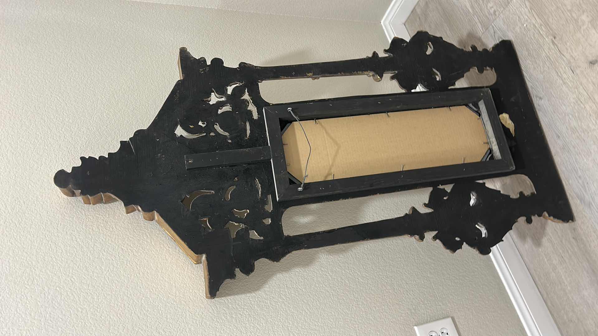 Photo 1 of ITALIAN BAROQUE-STYLE FIGURAL MIRROR FEATURING A GOLD GILT FINISH, A LARGE CENTRAL FEMALE FACE CREST, AND WINGED GRIFFINS ON THE BASE. 25” x H53“