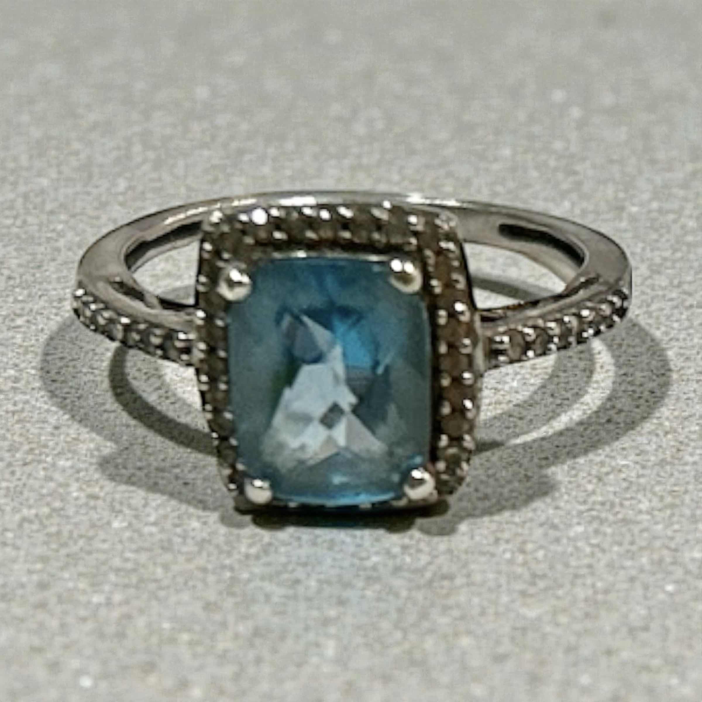 Photo 1 of STERLING SILVER BLUE TOPAZ HALO RING  WITH CZ EST SIZE 8