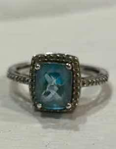 Photo 1 of STERLING SILVER BLUE TOPAZ HALO RING  WITH CZ EST SIZE 8