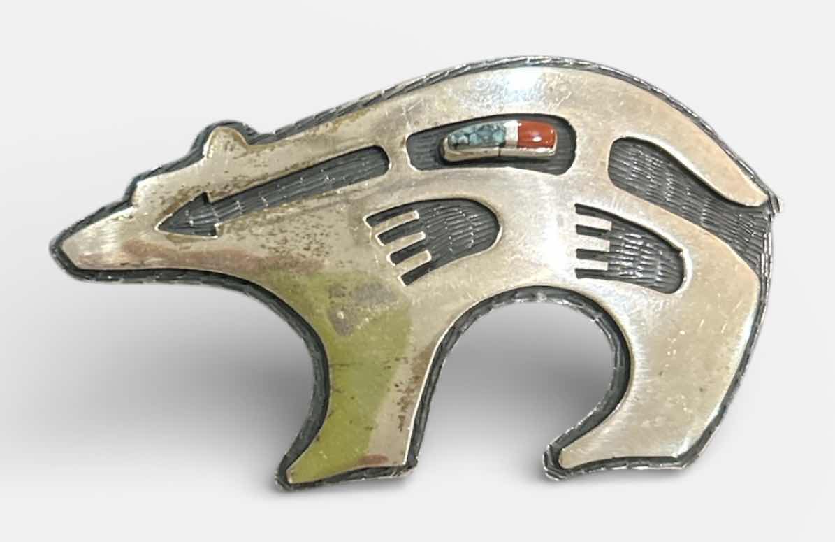 Photo 1 of VINTAGE HANDMADE SIGNED NAVAJO NATIVE AMERICAN STERLING SILVER BEAR PIN/PENDANT OFTEN REFERRED TO AS A “HEARTLINE” BEAR,” WHICH SYMBOLIZES STRENGTH, PROTECTION, AND SELF-KNOWLEDGE WITHIN NAVAJO CULTURE. 2.5”