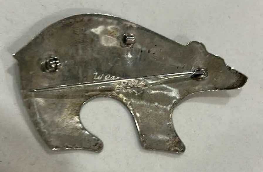 Photo 1 of VINTAGE HANDMADE SIGNED NAVAJO NATIVE AMERICAN STERLING SILVER BEAR PIN/PENDANT OFTEN REFERRED TO AS A “HEARTLINE” BEAR,” WHICH SYMBOLIZES STRENGTH, PROTECTION, AND SELF-KNOWLEDGE WITHIN NAVAJO CULTURE. 2.5”