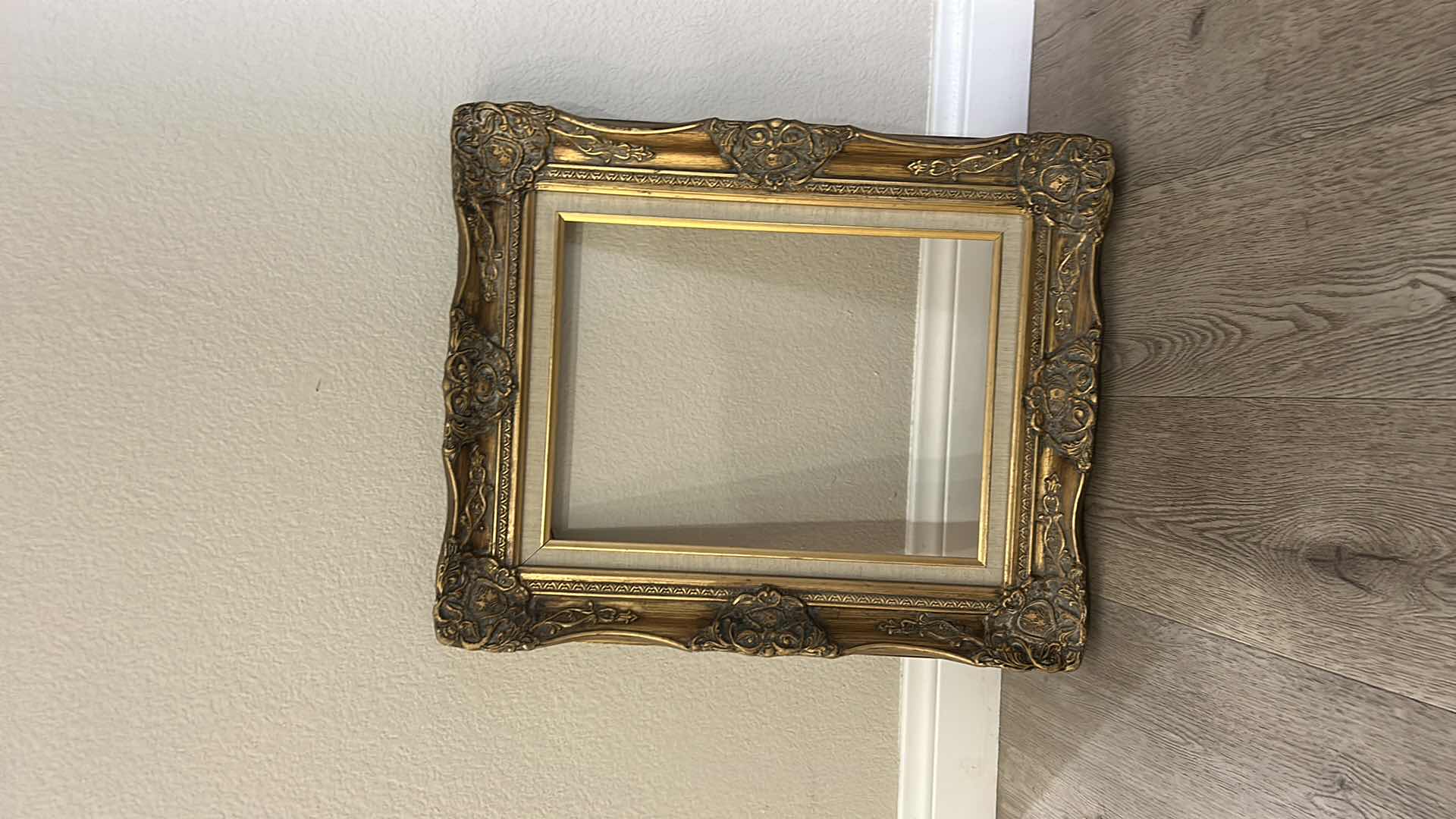 Photo 1 of ANTIQUE ORNATE WOOD GOLD PICTURE FRAME,  FEATURING BAROQUE OR ROCOCO STYLE CARVINGS. 19” x H22 1/2”
