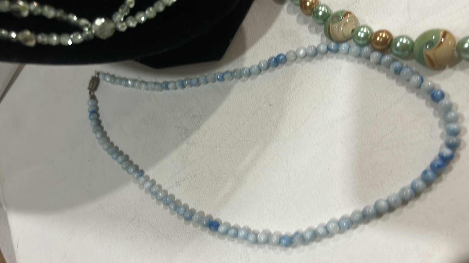 Photo 1 of FASHION JEWELRY- 4 NECKLACES AND 1 BRACELET