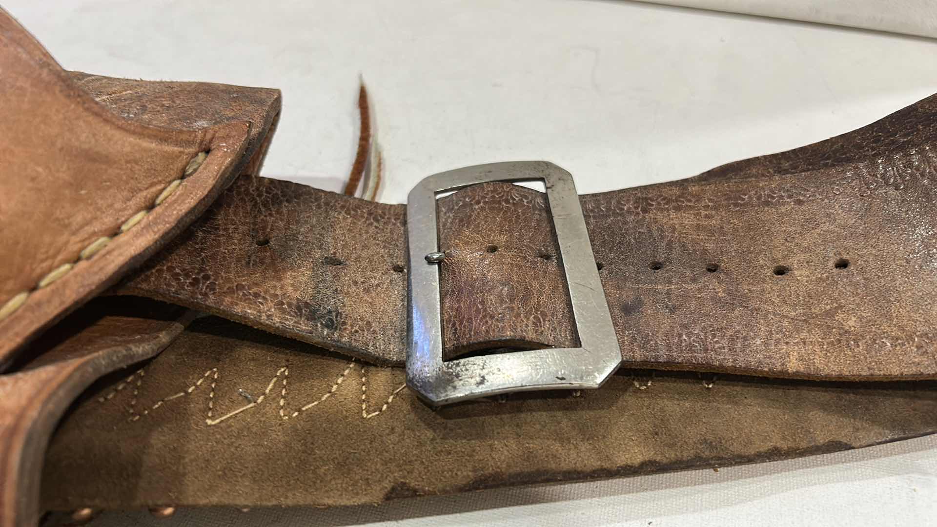 Photo 1 of ANTIQUE LEATHER BELT AND HOLSTER WITH FEDERAL 38 SPECIAL BULLETS