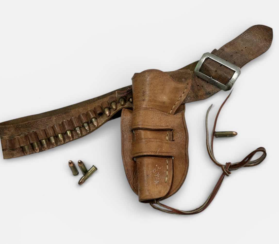 Photo 1 of ANTIQUE LEATHER BELT AND HOLSTER WITH FEDERAL 38 SPECIAL BULLETS