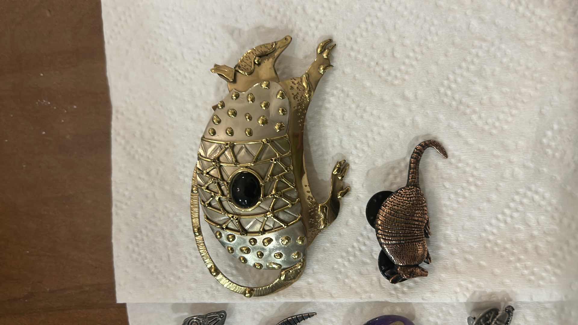 Photo 1 of FASHION JEWELRY- 15 ARMADILLO PINS/BROOCHES