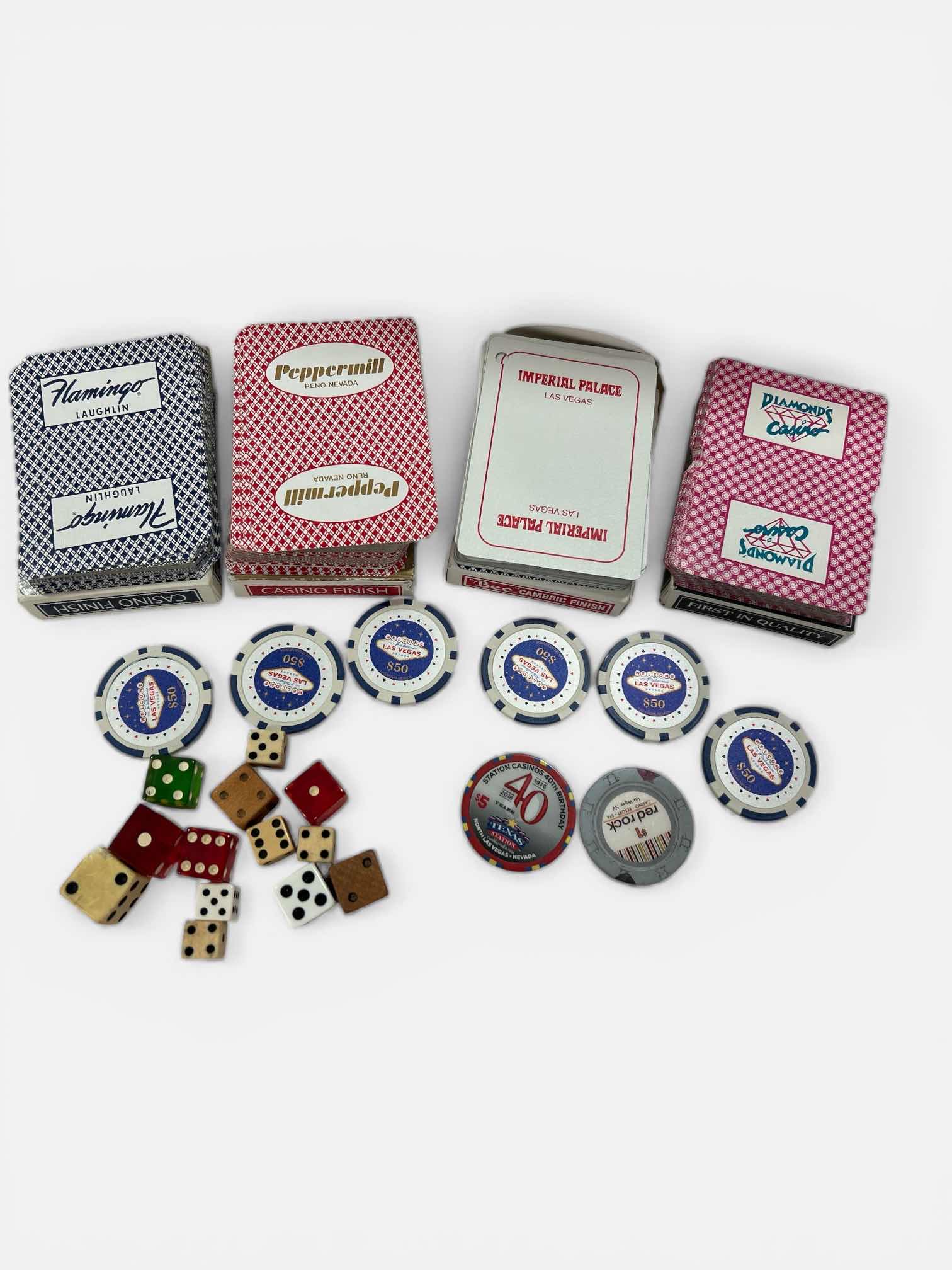 Photo 1 of LAS VEGAS CASINO PLAYING CARDS, DICE, 6 $50 REPLICA CHIPS AND 2 REAL CHIPS
