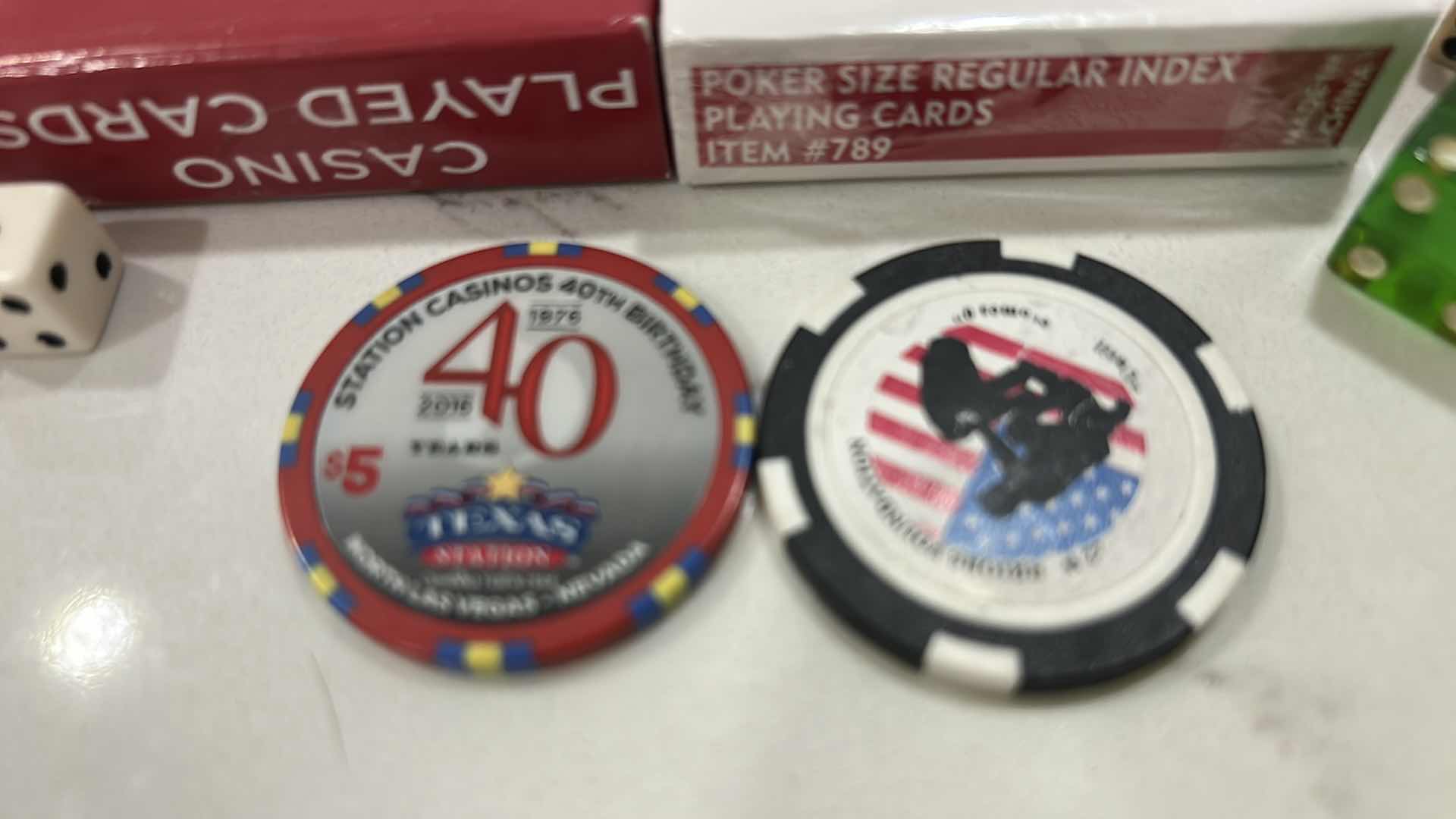 Photo 1 of LAS VEGAS CASINO PLAYING CARDS, DICE, 6 $50 REPLICA CHIPS AND 1 REAL CHIP, 1 COMMEMORATIVE TOKEN