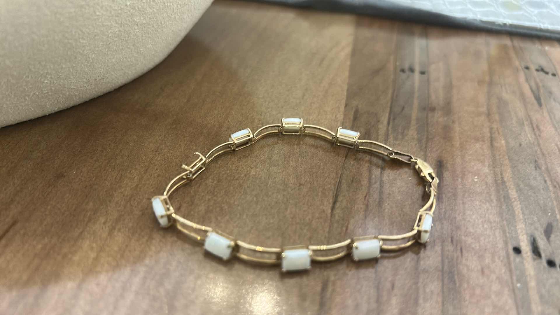 Photo 1 of 10K GOLD BRACELET WITH OPALS (1 OPAL IS MISSING)