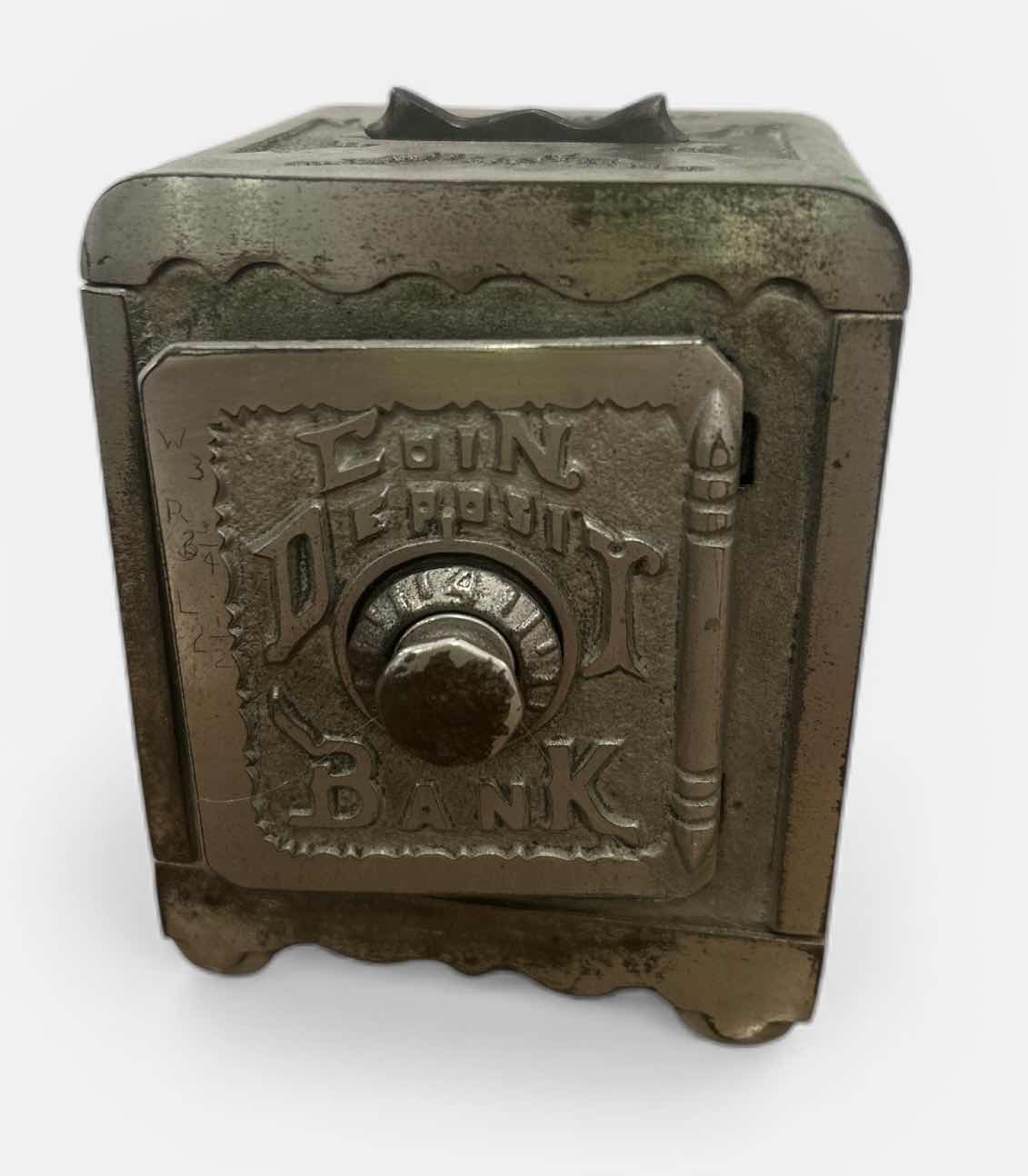 Photo 1 of CAST IRON “COIN DEPOSIT BANK” STYLED AS A MINIATURE COMBINATION SAFE, LIKELY PRODUCED BY THE GREY IRON CASTING COMPANY AROUND THE 1920S.