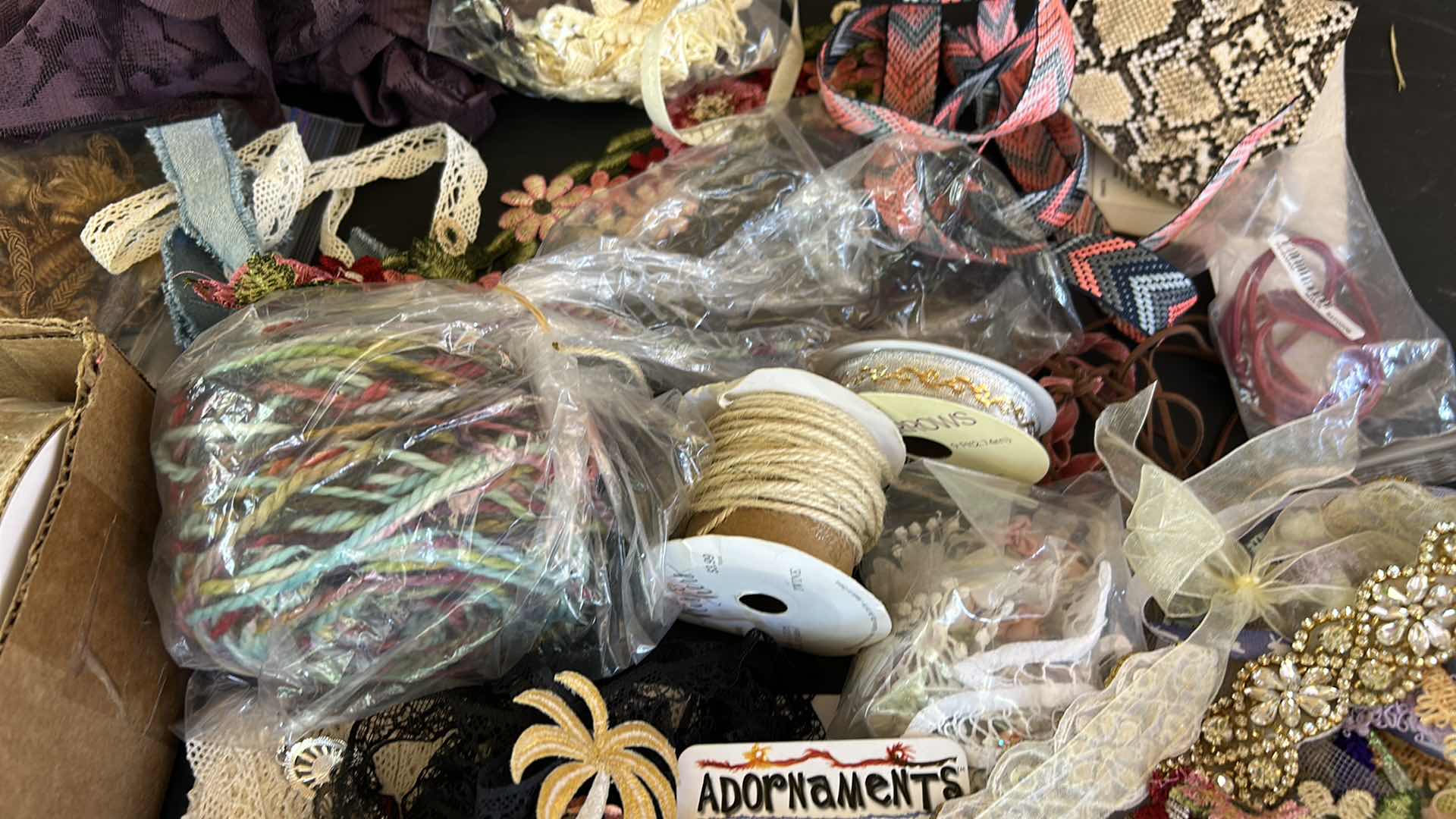 Photo 1 of CRAFTING SUPPLIES- RIBBONS, CORDS, AND MORE