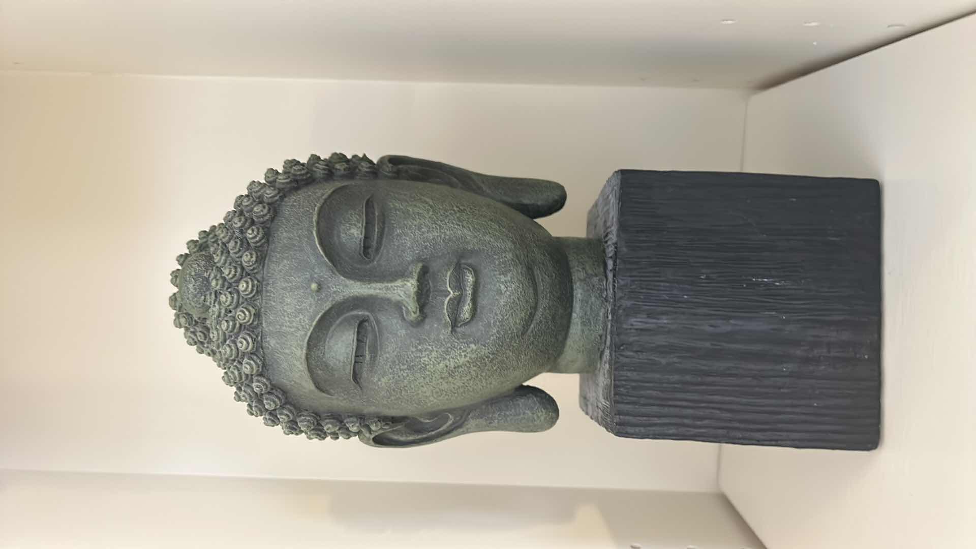 Photo 1 of DECORATIVE BUDDHA BUST FIGURINE MOUNTED ON A PEDESTAL BASE H11”.