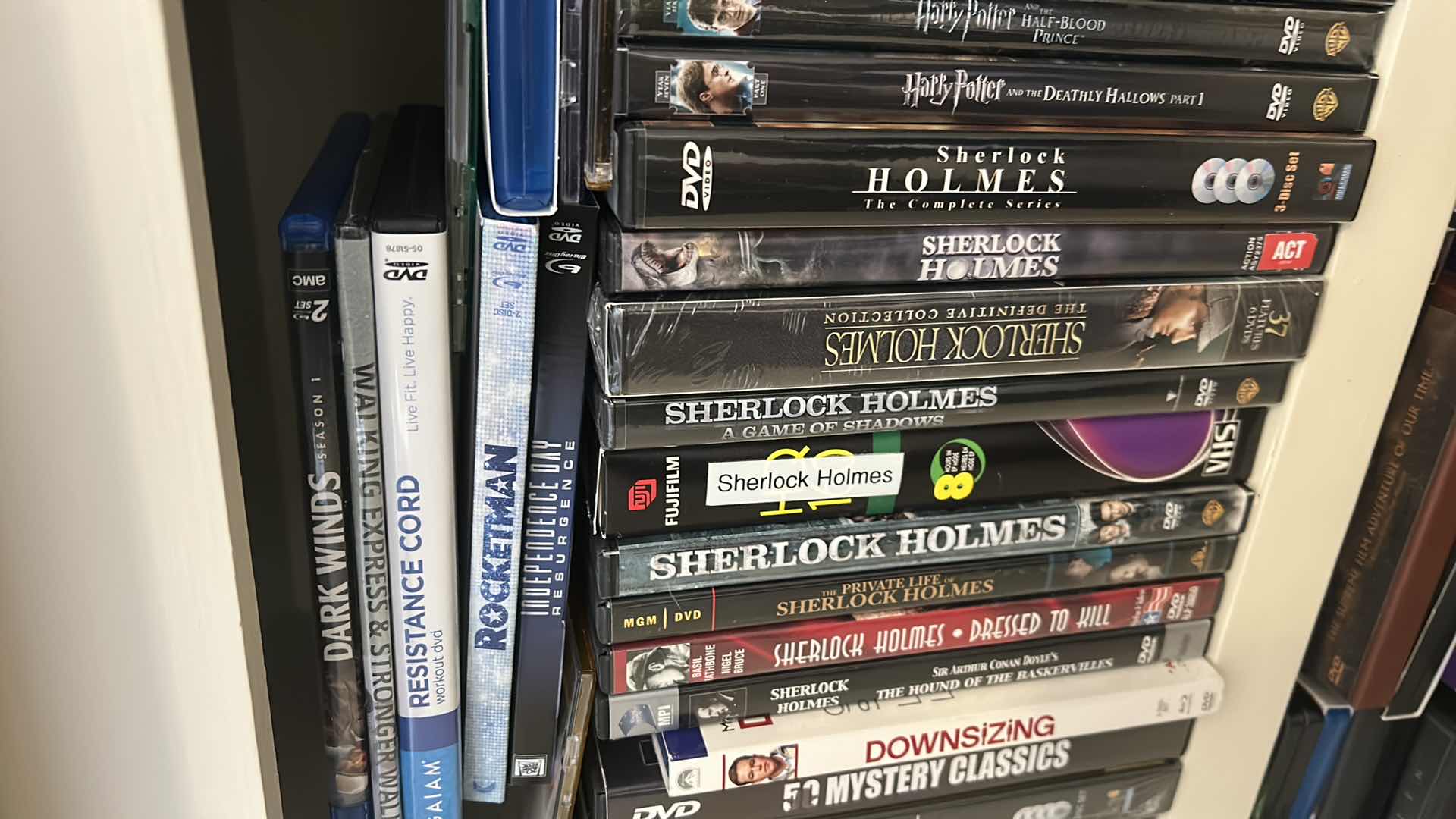 Photo 1 of 2 SHELVES OF DVD’s