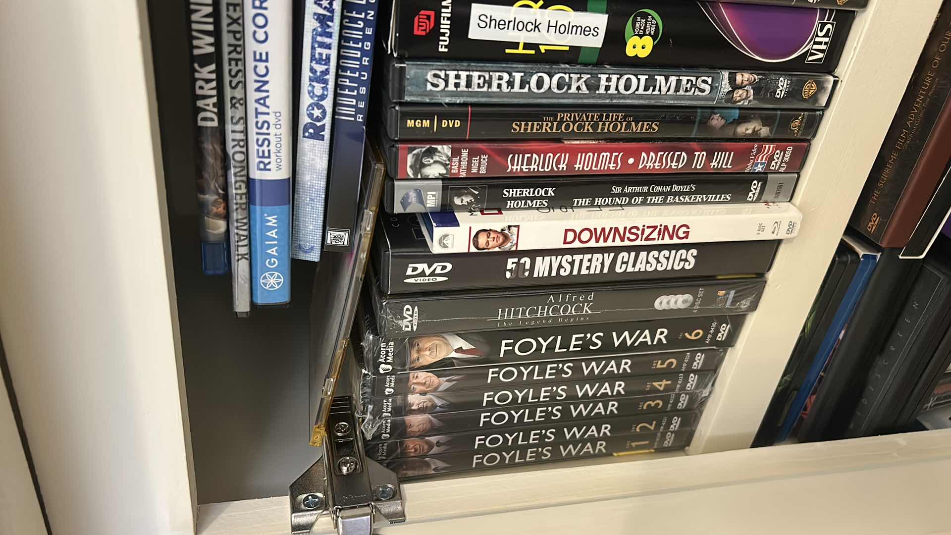 Photo 1 of 2 SHELVES OF DVD’s