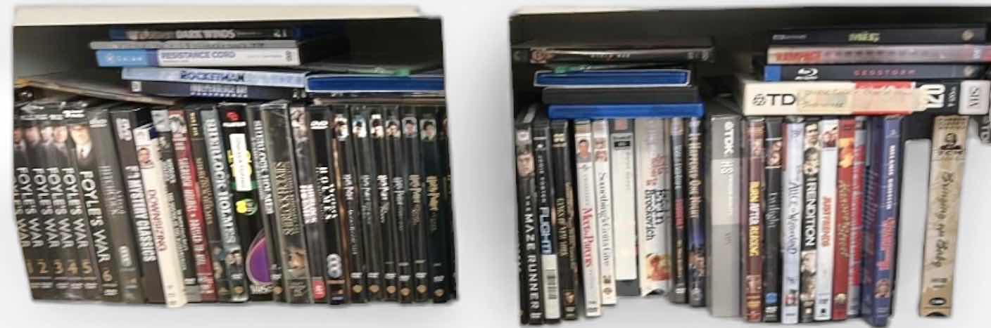Photo 1 of 2 SHELVES OF DVD’s