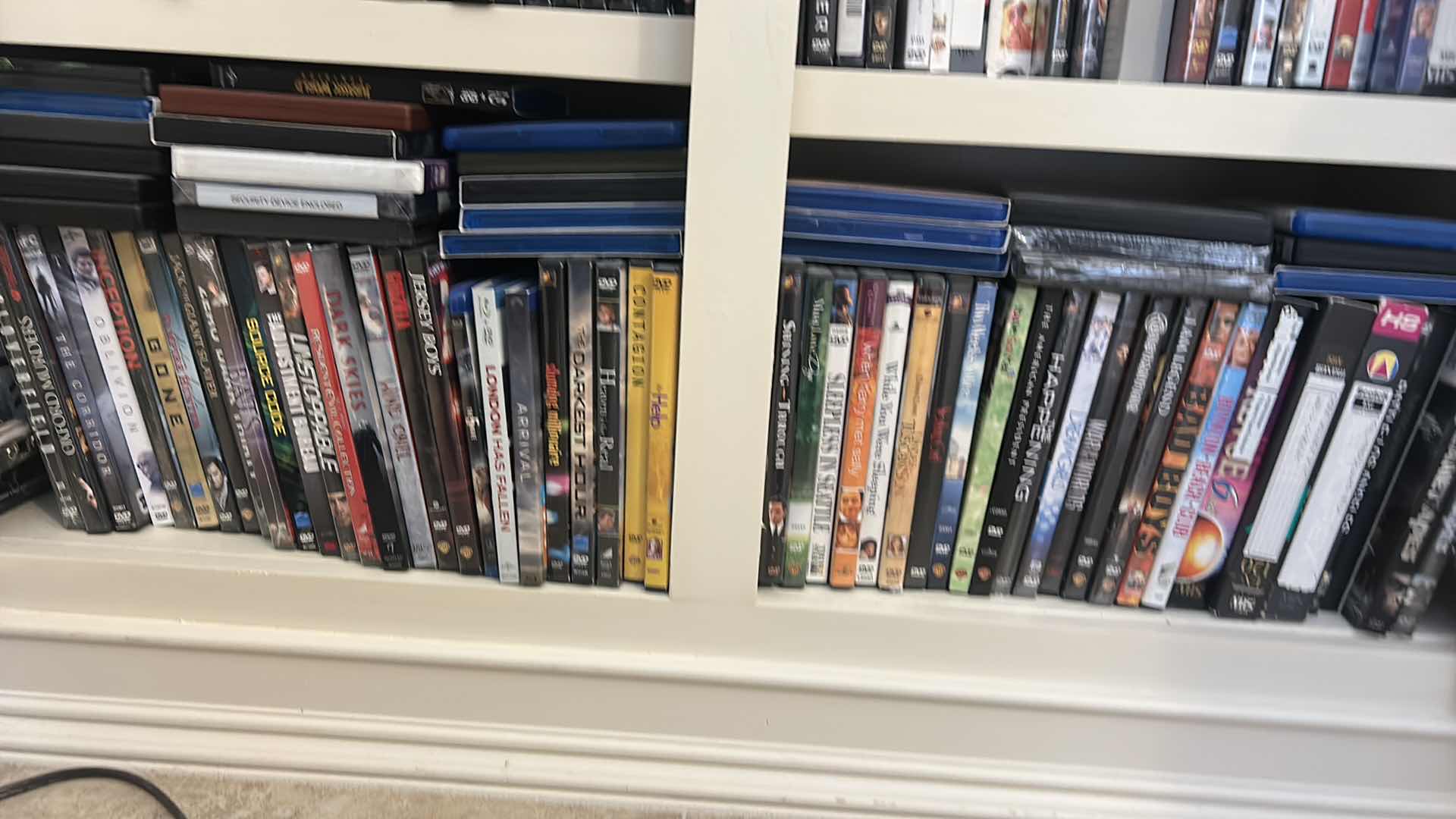 Photo 1 of 2 SHELVES OF DVD’S