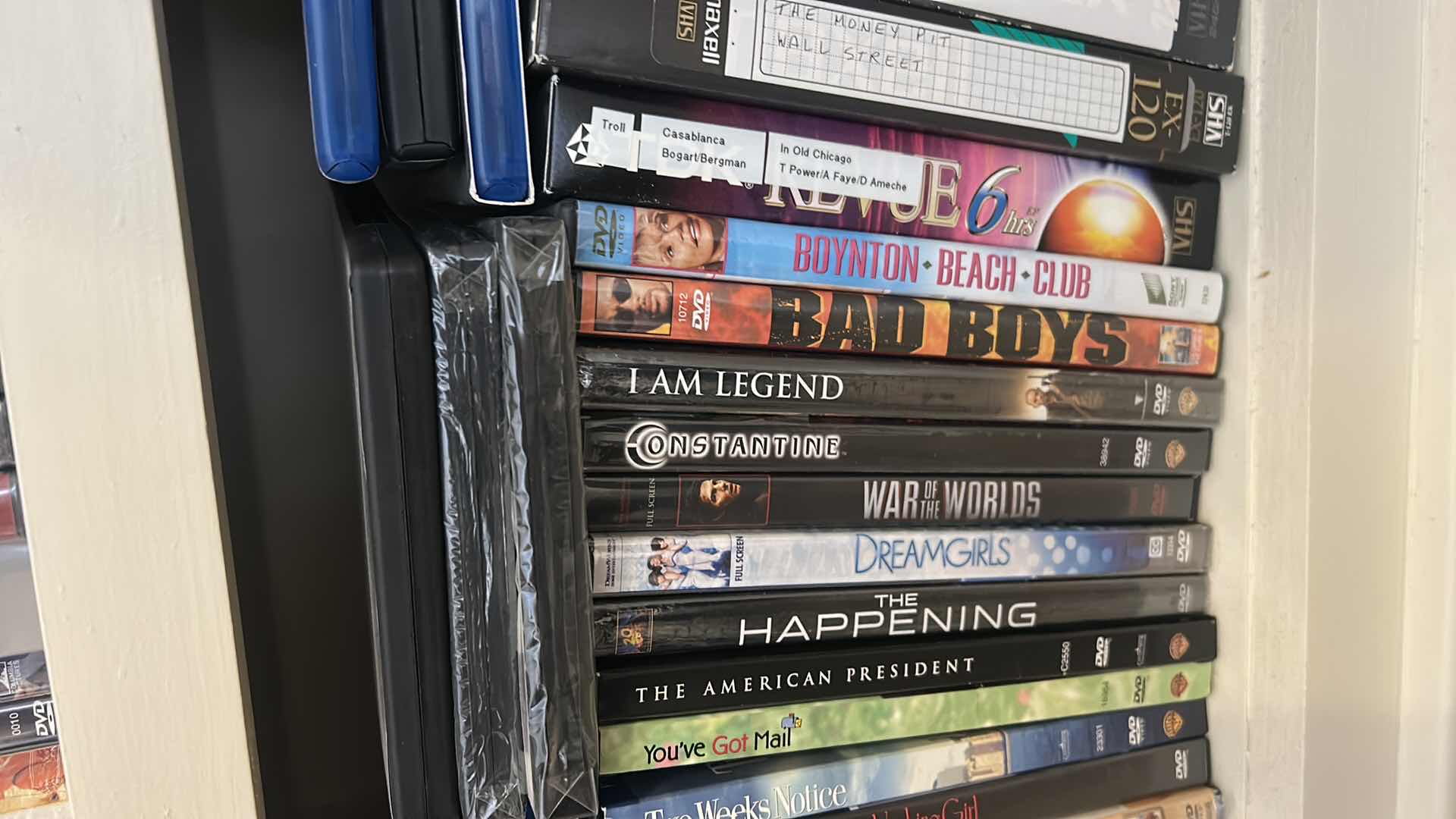 Photo 1 of 2 SHELVES OF DVD’S