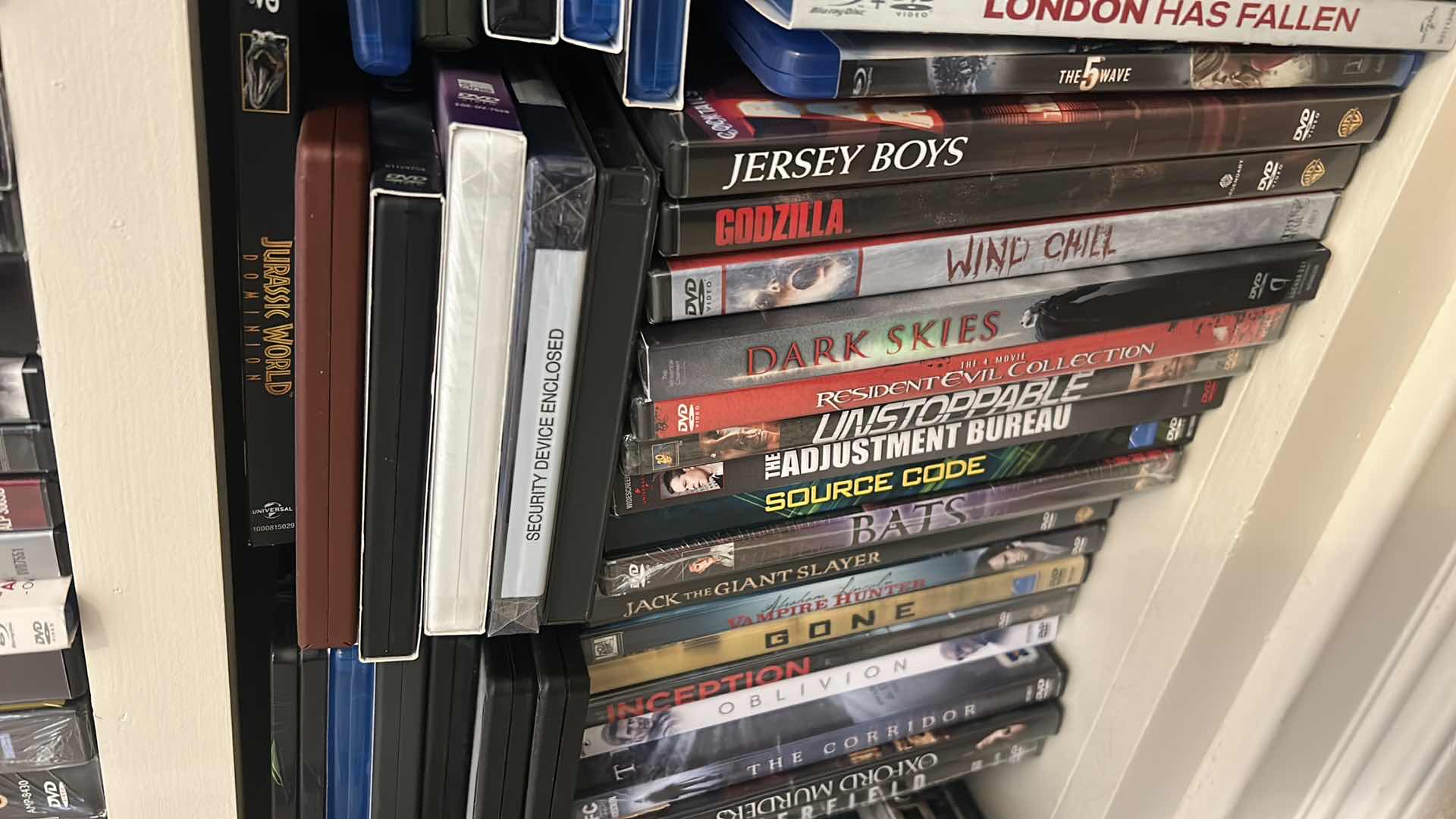 Photo 1 of 2 SHELVES OF DVD’S