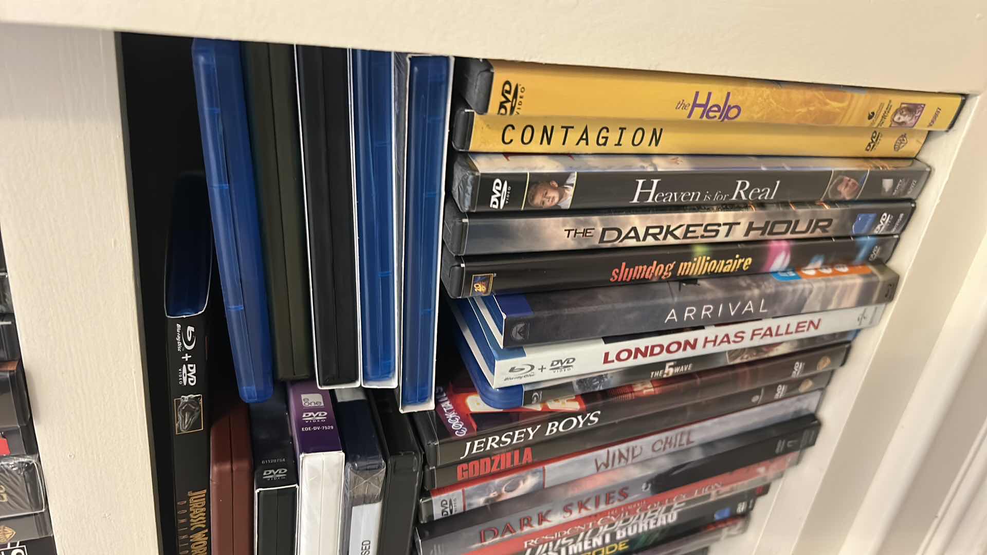 Photo 1 of 2 SHELVES OF DVD’S