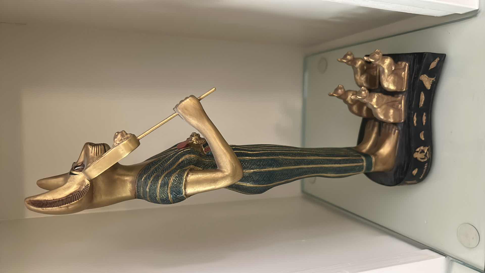 Photo 1 of CERAMIC DECORATIVE STATUE OF THE ANCIENT EGYPTIAN CAT GODDESS BASTET, OFTEN DEPICTED HOLDING A SISTRUM AND SURROUNDED BY SMALLER KITTENS. H13”