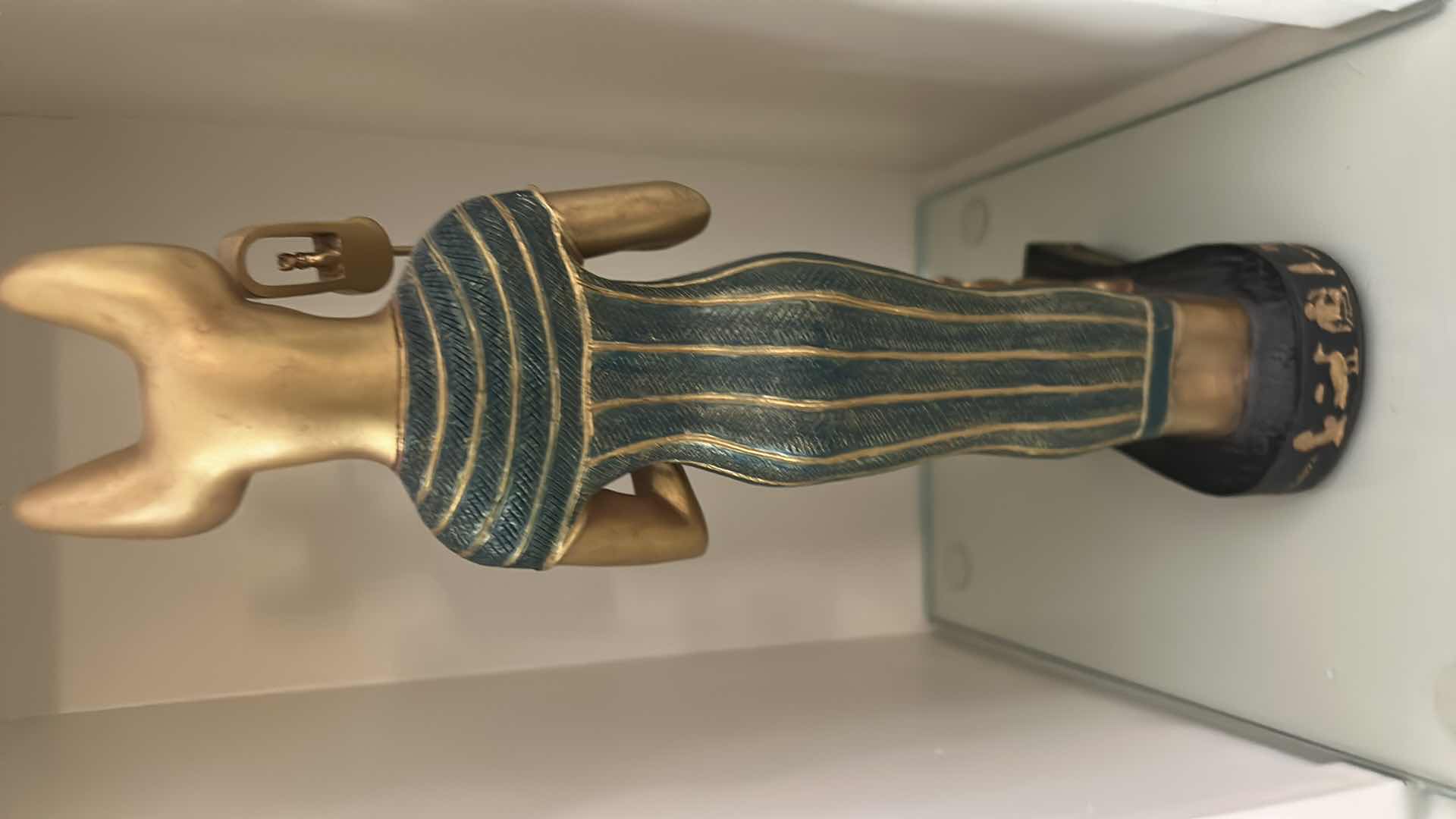 Photo 1 of CERAMIC DECORATIVE STATUE OF THE ANCIENT EGYPTIAN CAT GODDESS BASTET, OFTEN DEPICTED HOLDING A SISTRUM AND SURROUNDED BY SMALLER KITTENS. H13”