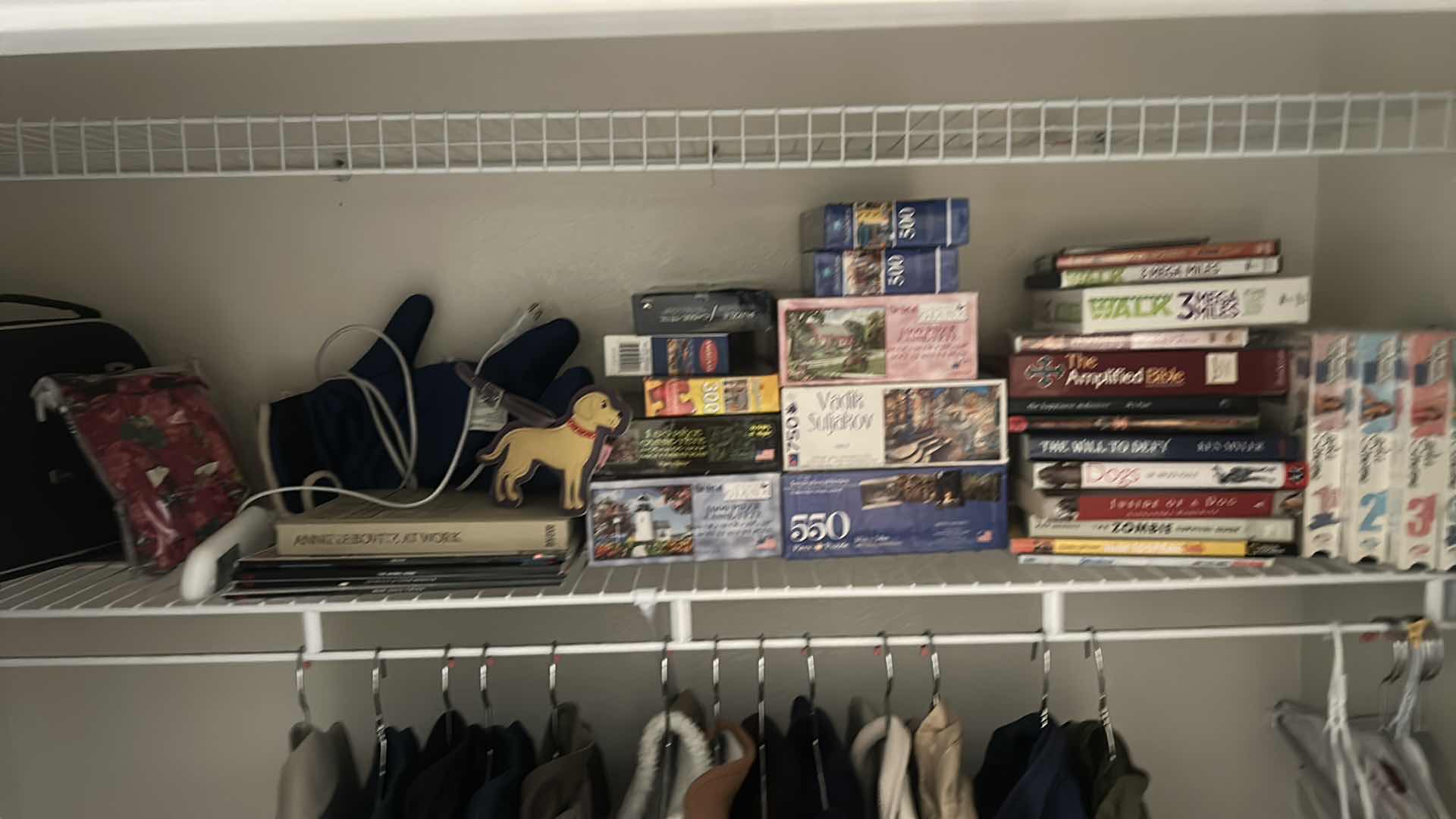 Photo 1 of CONTENTS ON SHELF- PUZZLES, BOOKS, VHS, AND MORE
